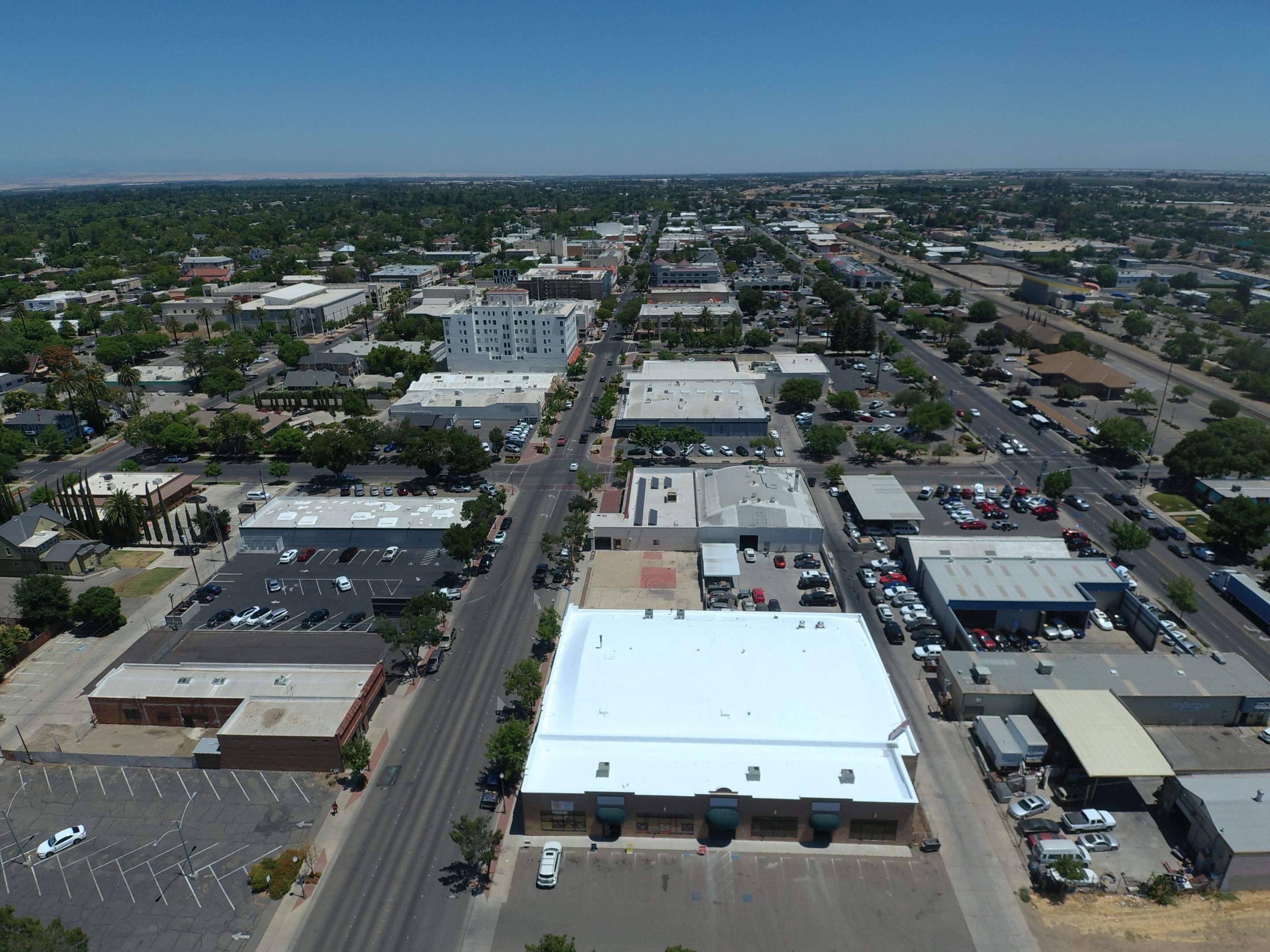 Spray foam and coatings using Conklin Benchmark/PUMA XL coatings and spray foam by Straight Edge Roofing Inc