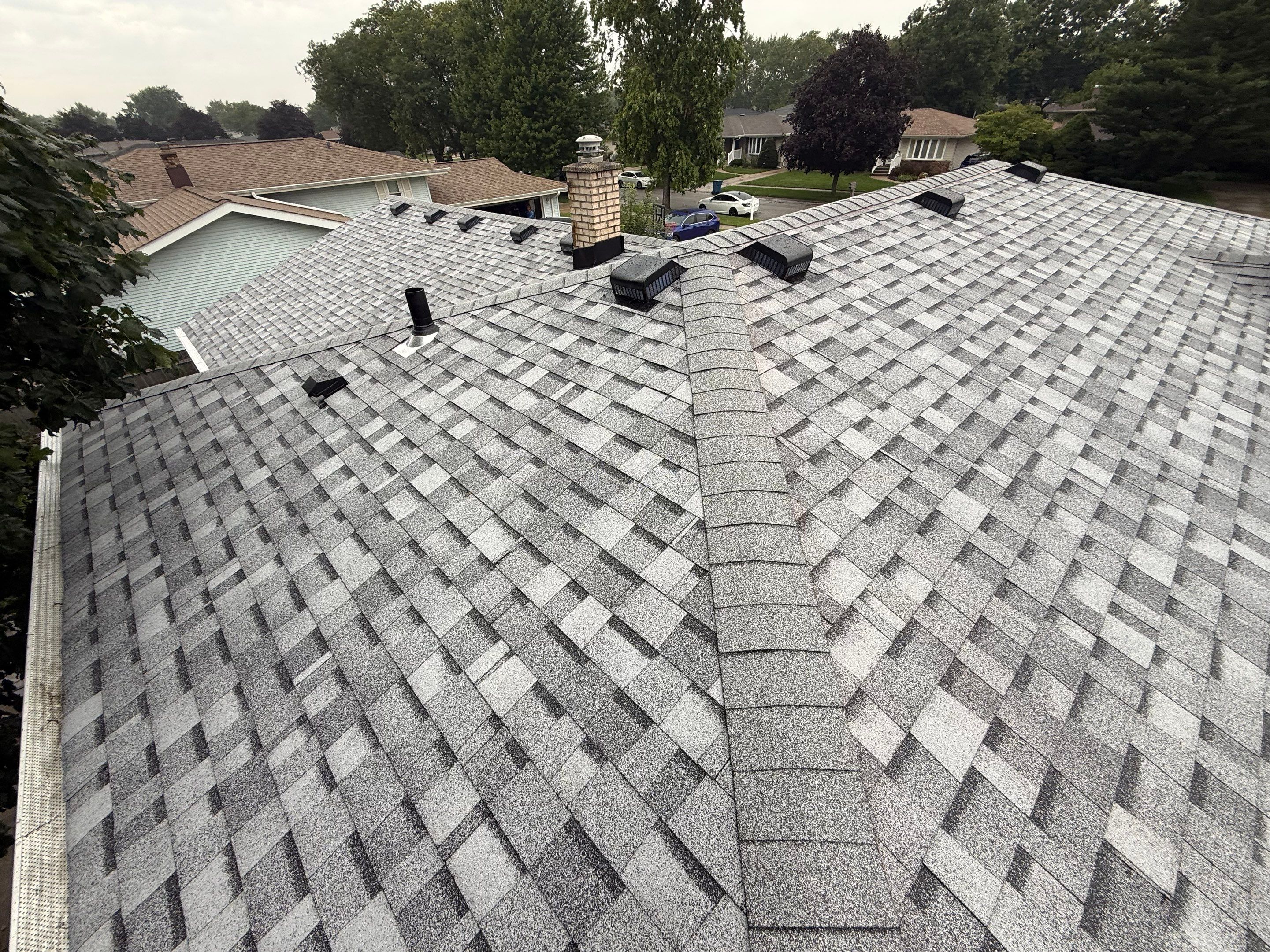 Roofing & gutters by Optimal Home Improvement 
