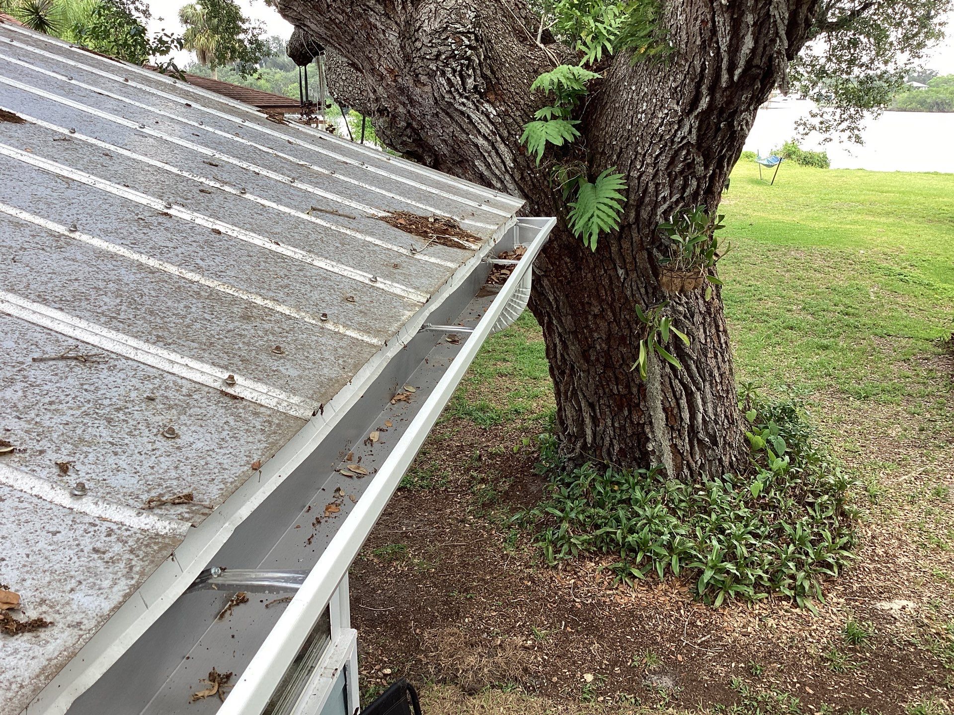 White 6-Inch Gutters and Leaf Guard Installation in Fort Myers FL by Gutter Professors