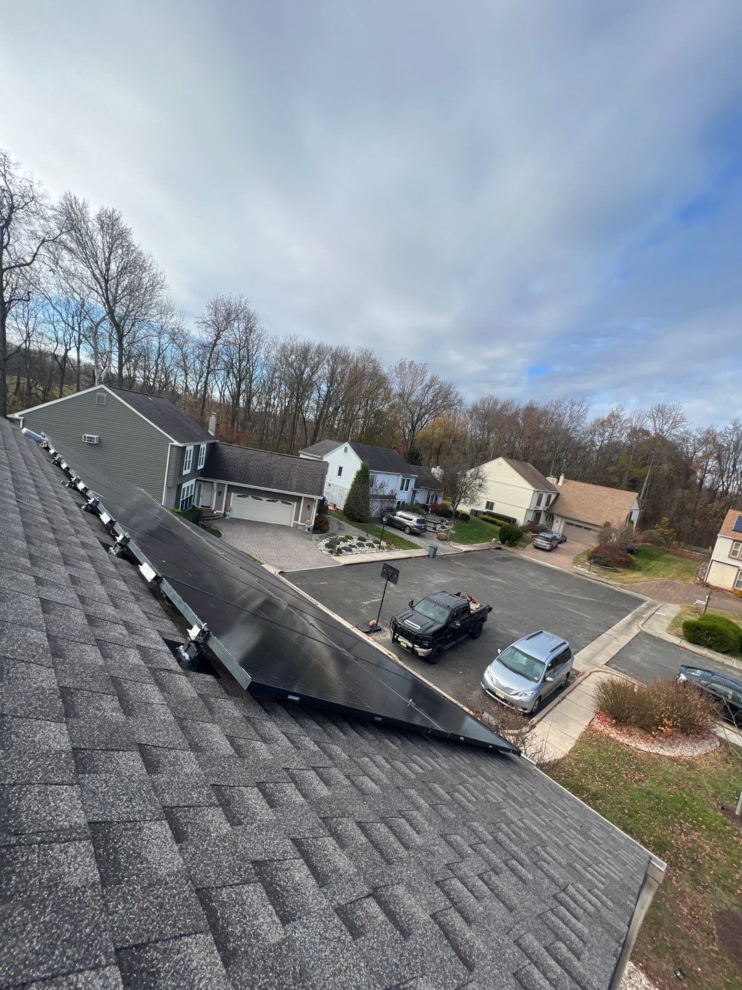 Onyx Black Shingles by Reimagine Roofing