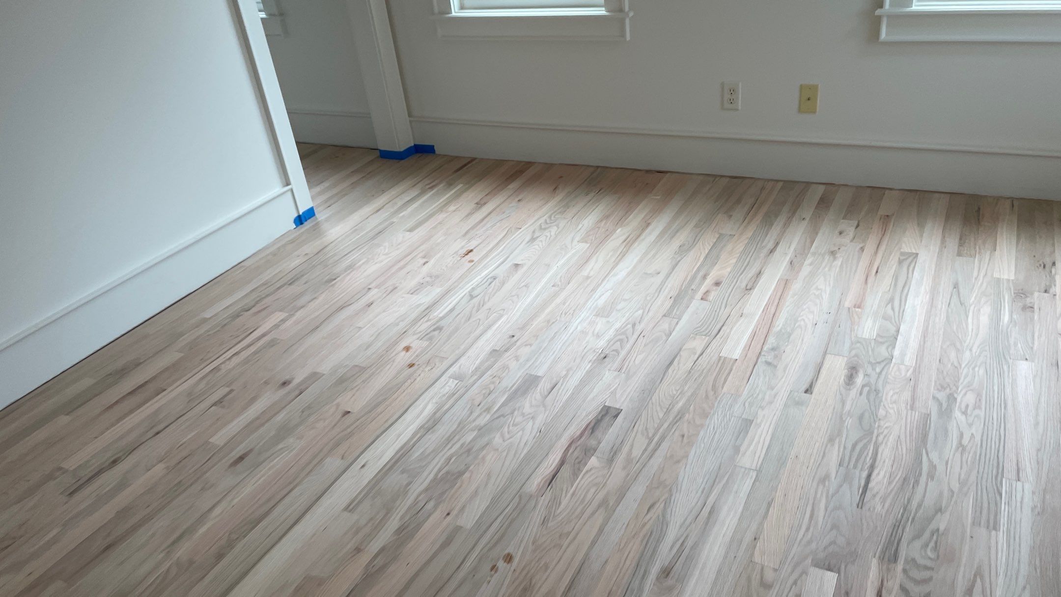 Herringbone Wood Hallway and Rooms by Footprints Floors of Coastal Carolina