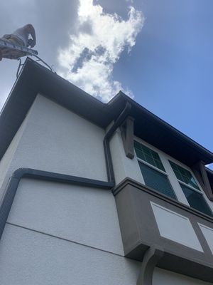 Black Seamless Gutters for Modern Homes in Naples FL 