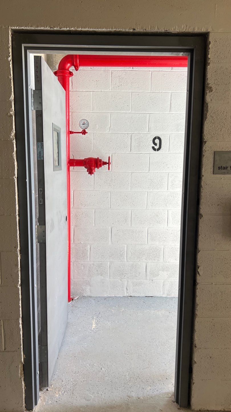 Commercial Stairwell Door Replacement & Hollow Metal Door Retrofit – Pompano Beach High-Rise by The Door Doctor of South Florida, Inc.