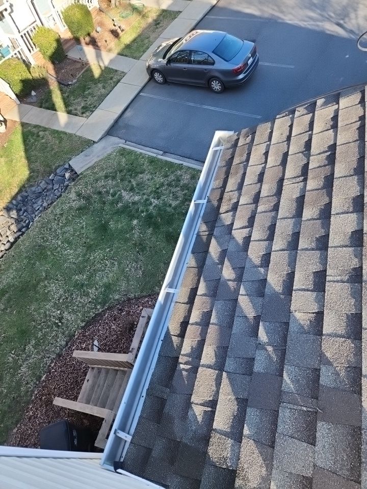 Gutter Cleaning using water by Power Wash Masters LLC