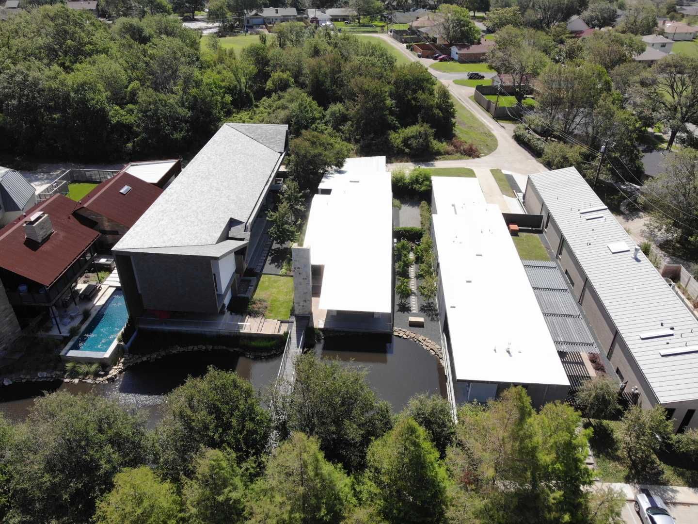 Metal Roofing project using MBCI Flexloc Panels - 22 gauge - silver metallic-in-color by Becker Roofing and Exteriors