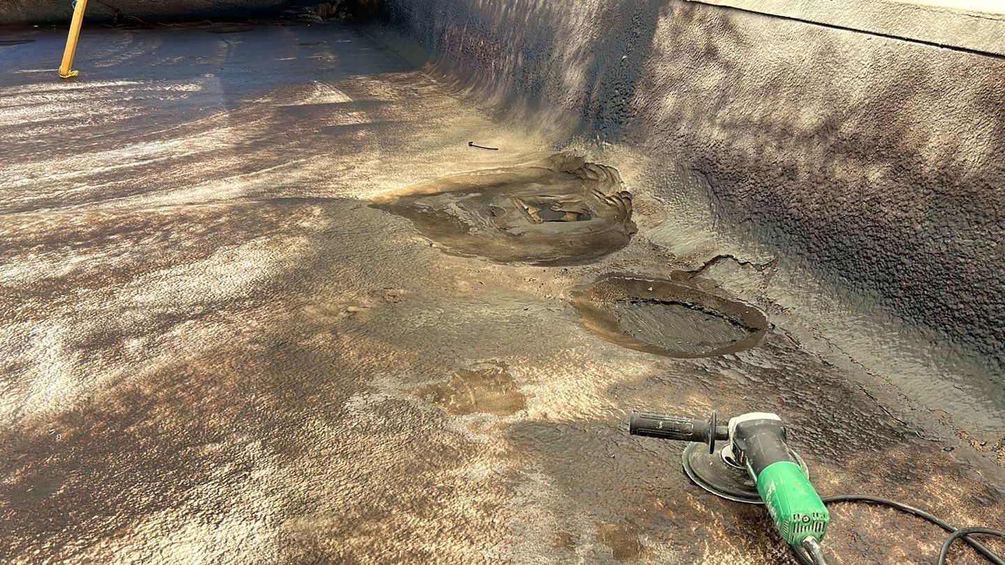 Foam Refurbish using Conklin Benchmark/PUMA XL coatings and spray foam; Also metal roofing around parapet wall by Straight Edge Roofing Inc