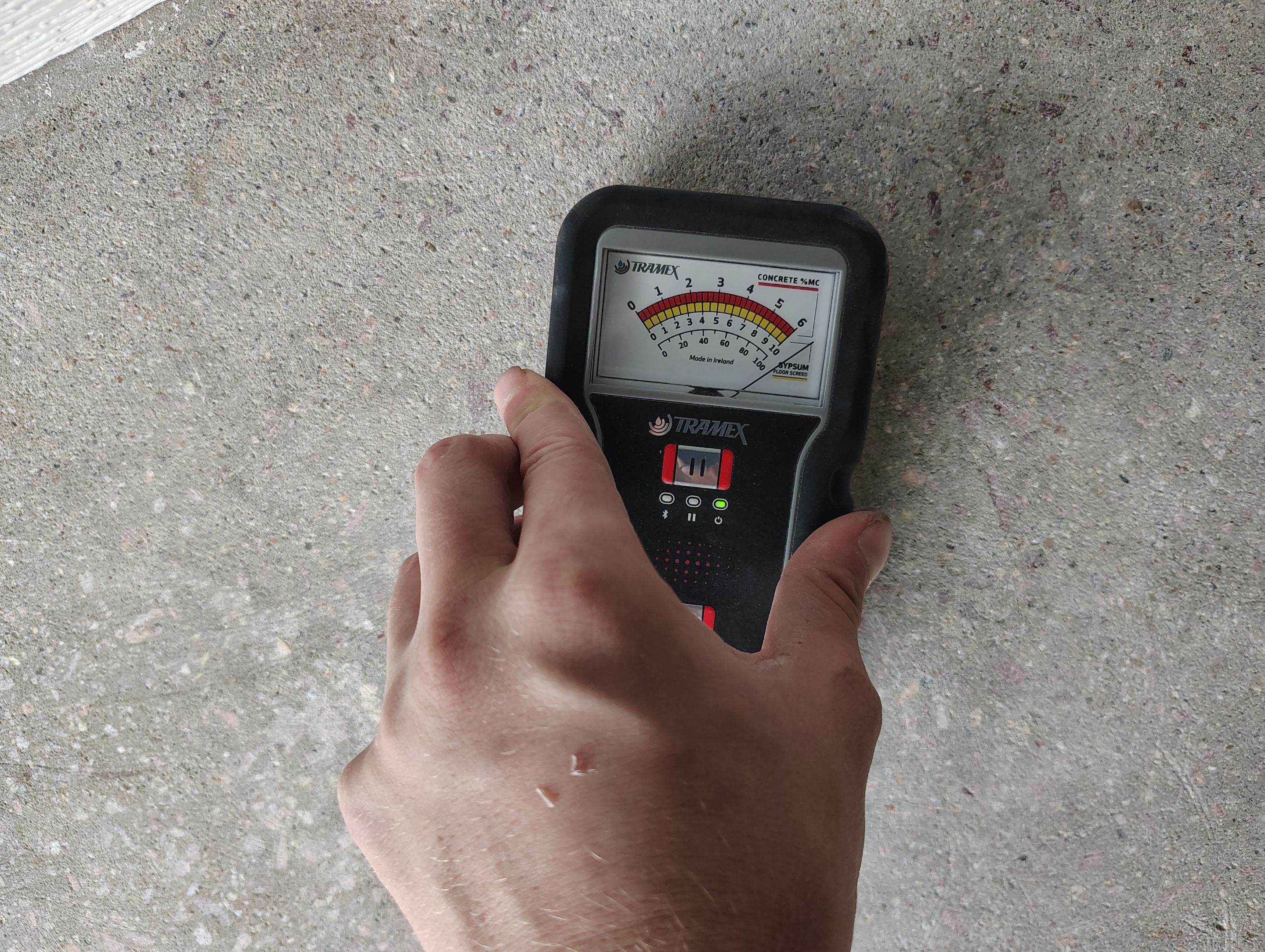 Custom Garage Floor Coating and Backyard Patio Refinishing in Tyndall by Select Painting, Coatings & Garage Cabinets