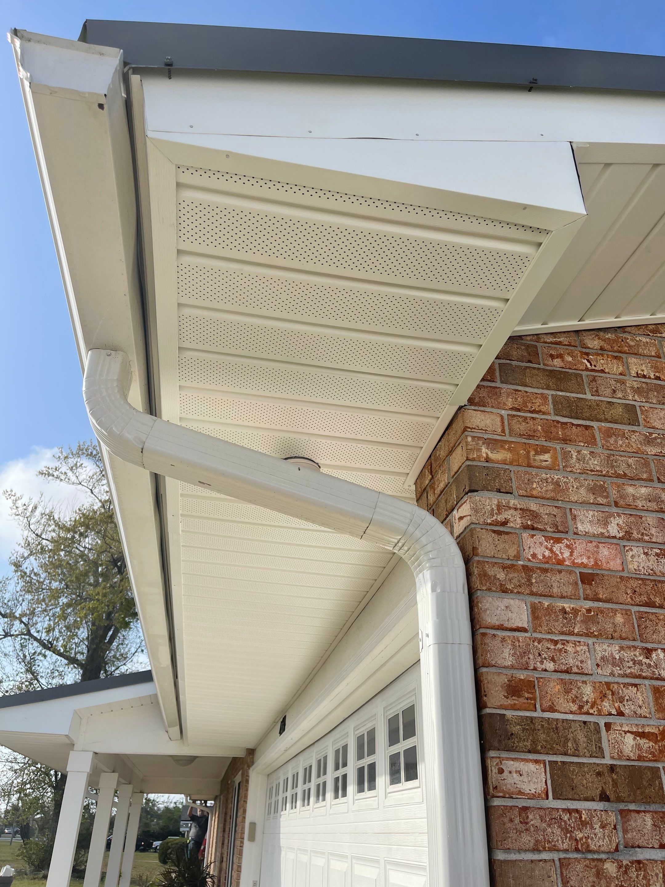 Soffit and Fascia Installation Using White Vinyl Soffit by Gutter Professors