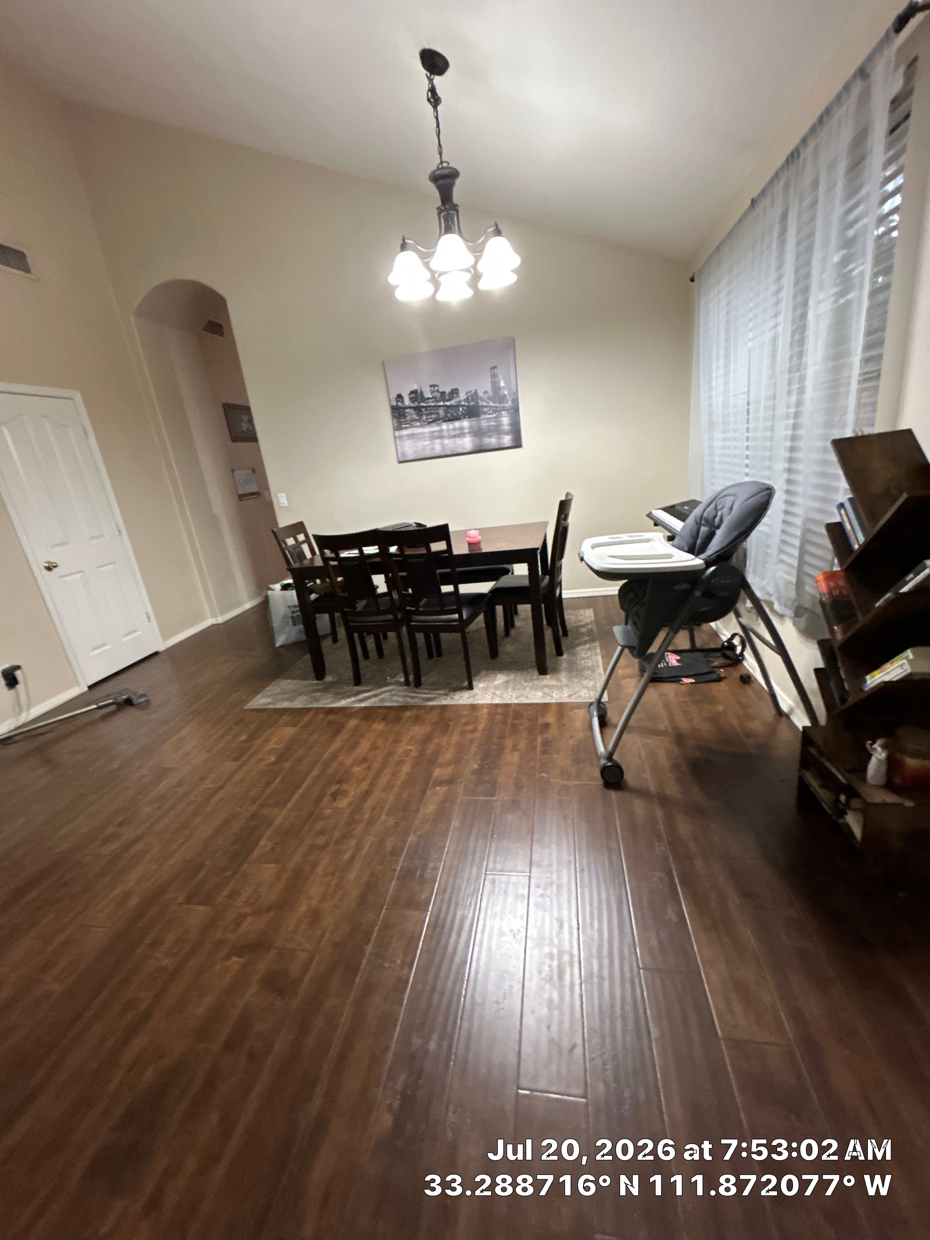 Dark Wood-Look Laminate Flooring Installation in Chandler Dining Room by CompanyCam Sales Demo