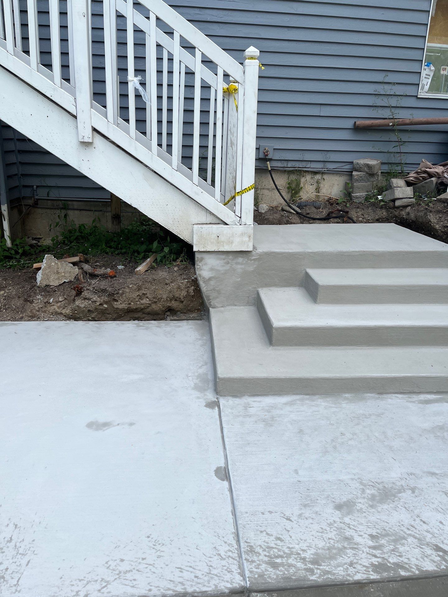 Concrete Back Patio Makeover  by Jireh Asphalt & Concrete Inc 