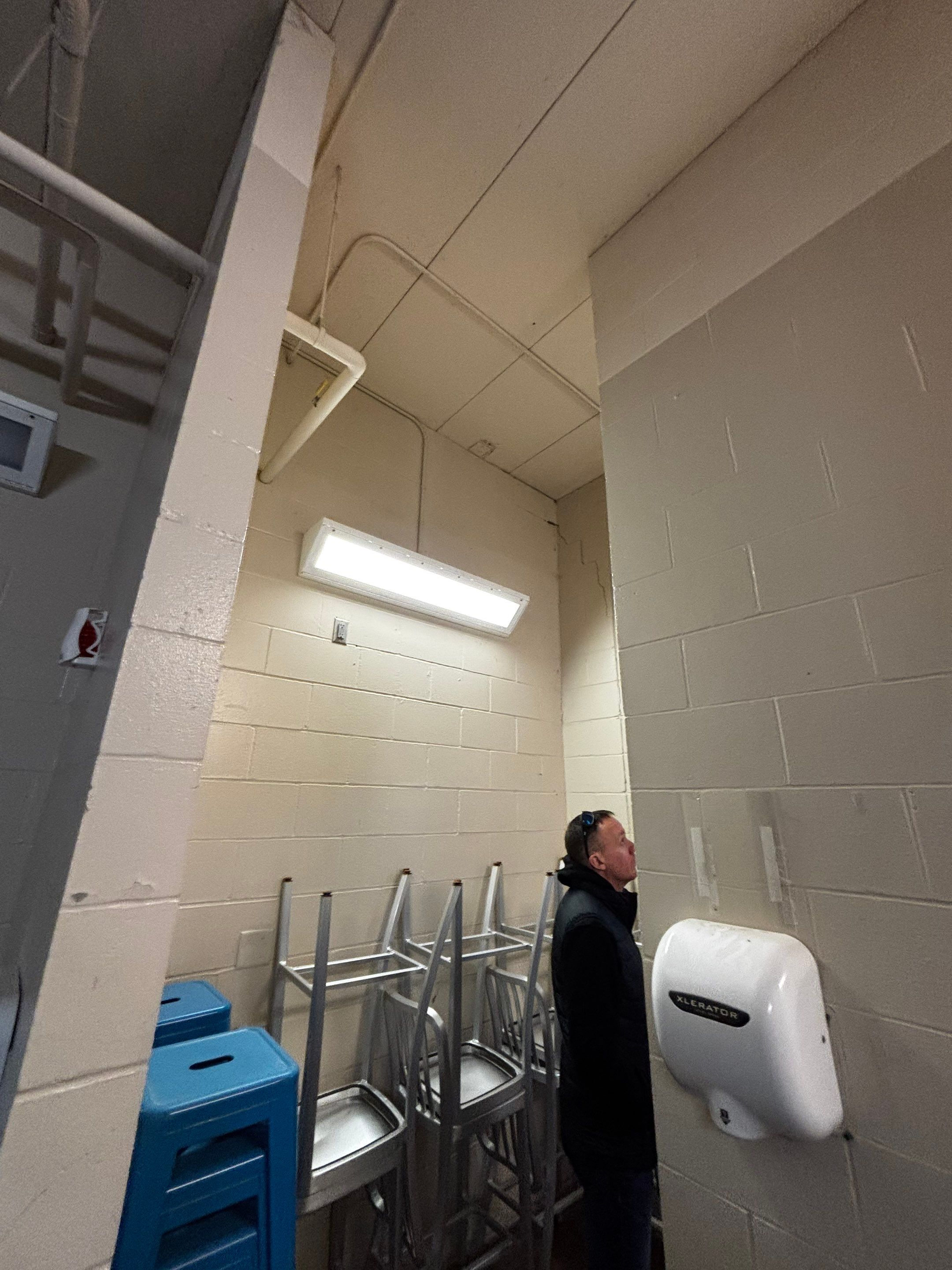 Commercial Restroom Interior Painting and Facility Updates in Sioux Falls by Select Painting, Coatings & Garage Cabinets