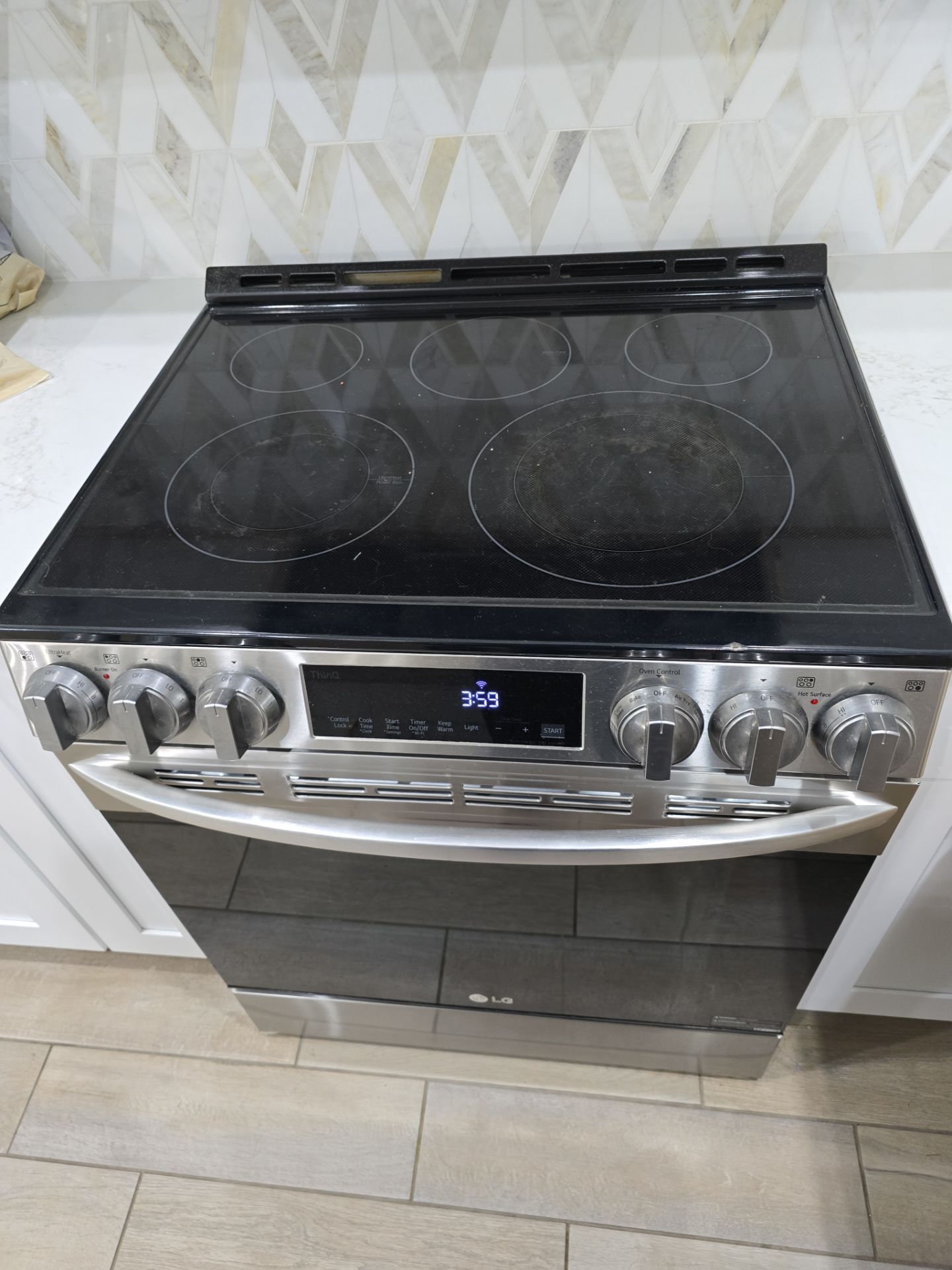 Chipped Glass Cooktop  by AMB-WORKS APPLIANCE REPAIR