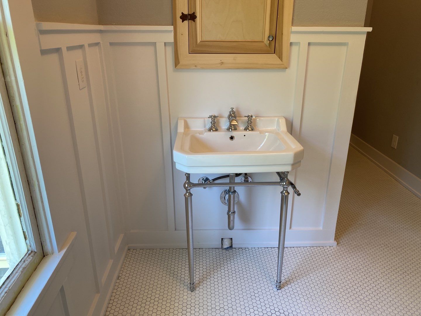 Historic Home Built in 1900 Bathroom Remodel by SLM General Contractors & Roofing