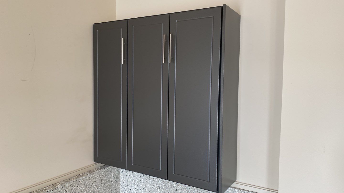 Judi K. adds storage to garage!  by Banner Garage