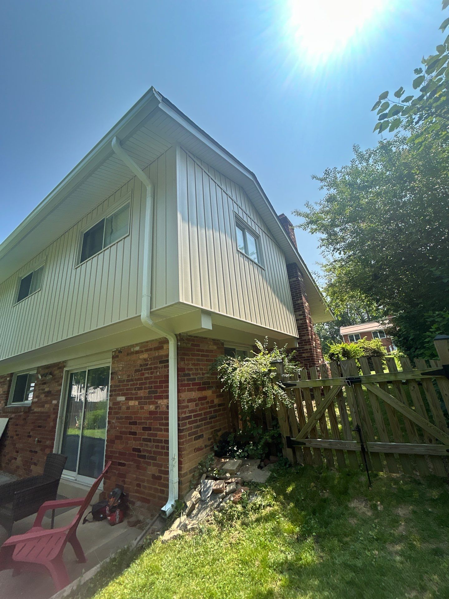 Fairfax: Residential Siding Replacement with CertainTeed 8" Board and Batten Siding in Desert Tan by RM Banning, Inc.