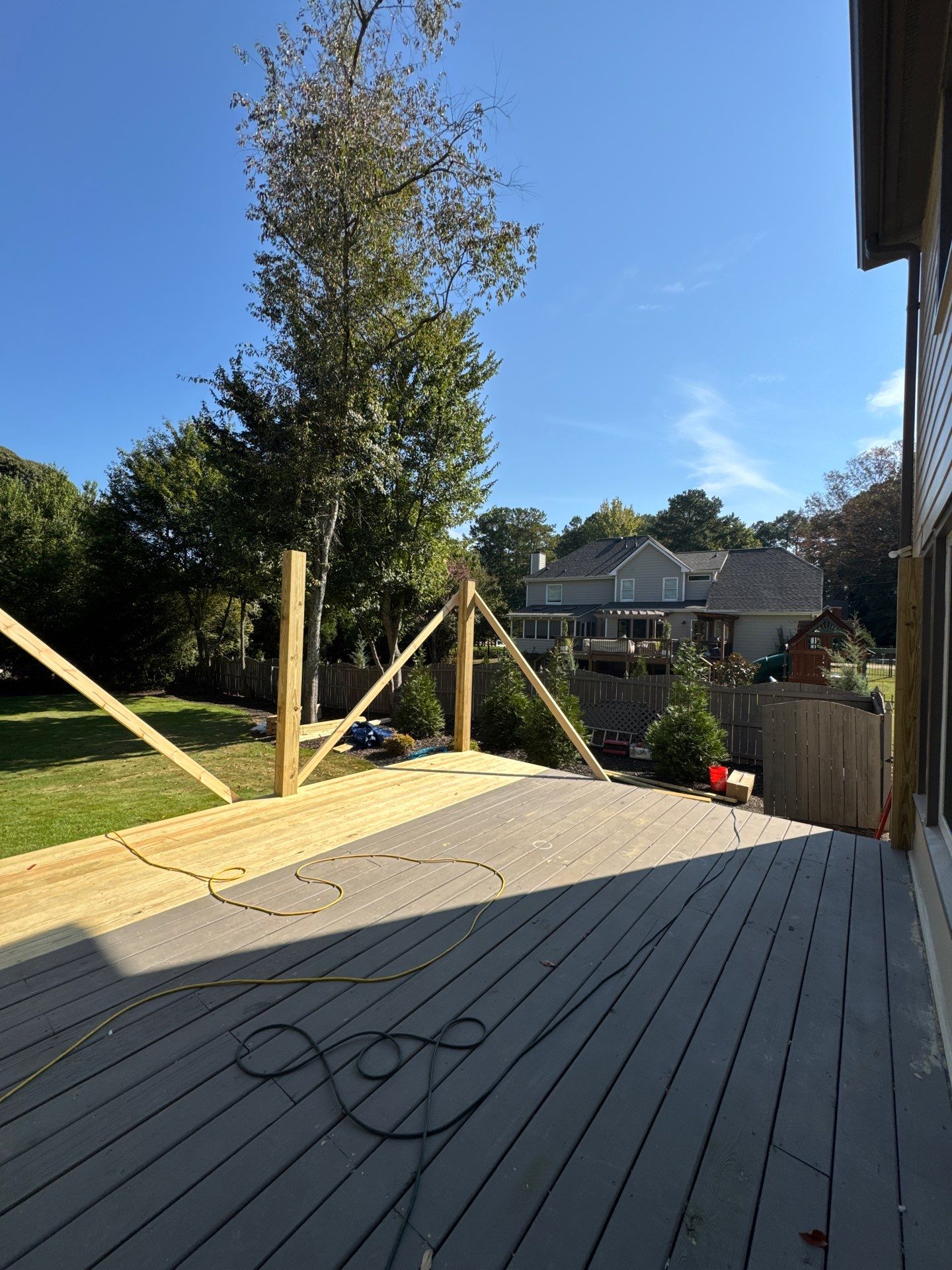 Custom Multi-Level Composite Deck and Screened-In Porch in Marietta by Swift Home Renovations
