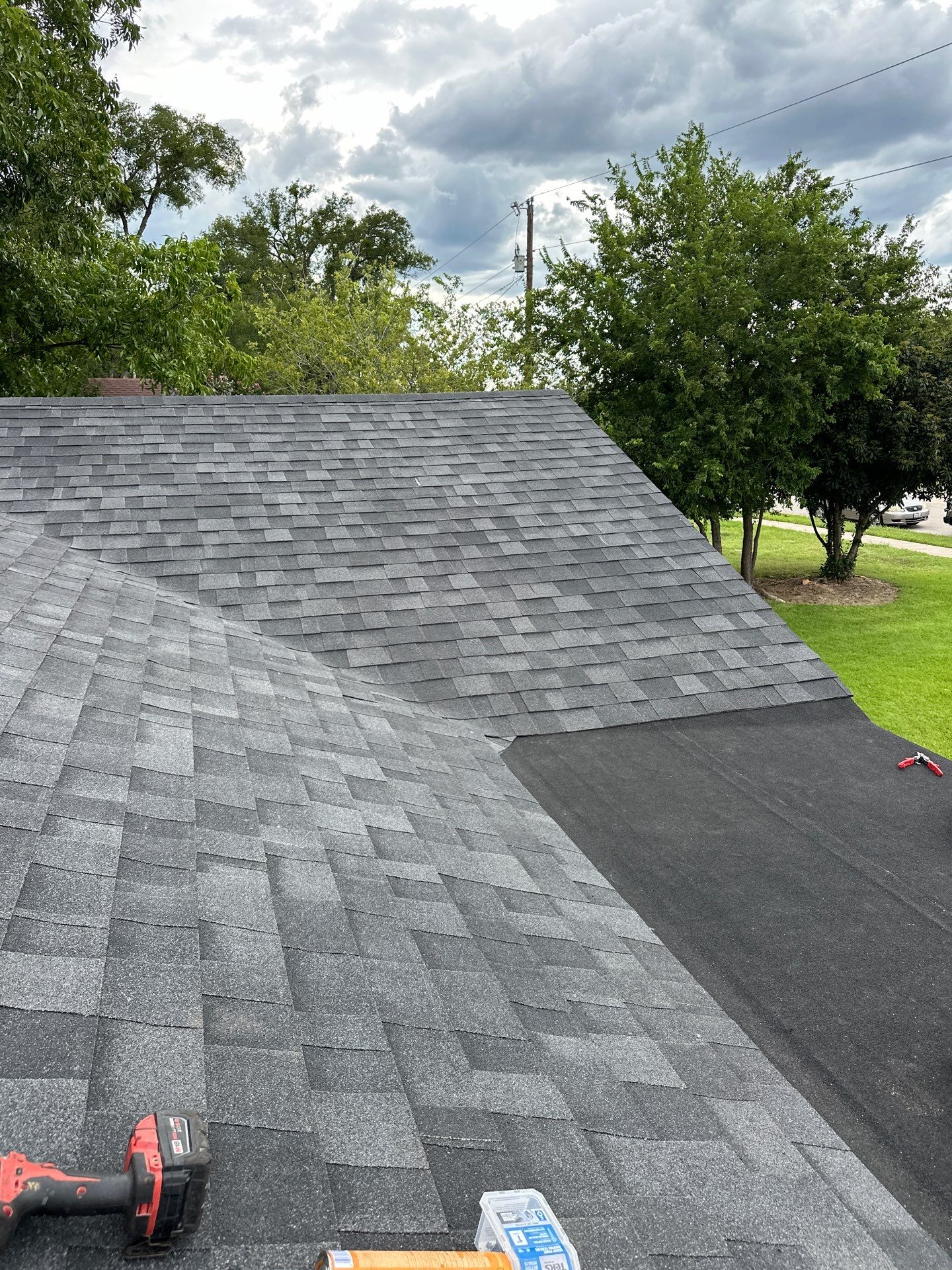 Residential Roofing Installation using Owens Corning Oakridge Onyx Black by DeZign Roofing & Exteriors