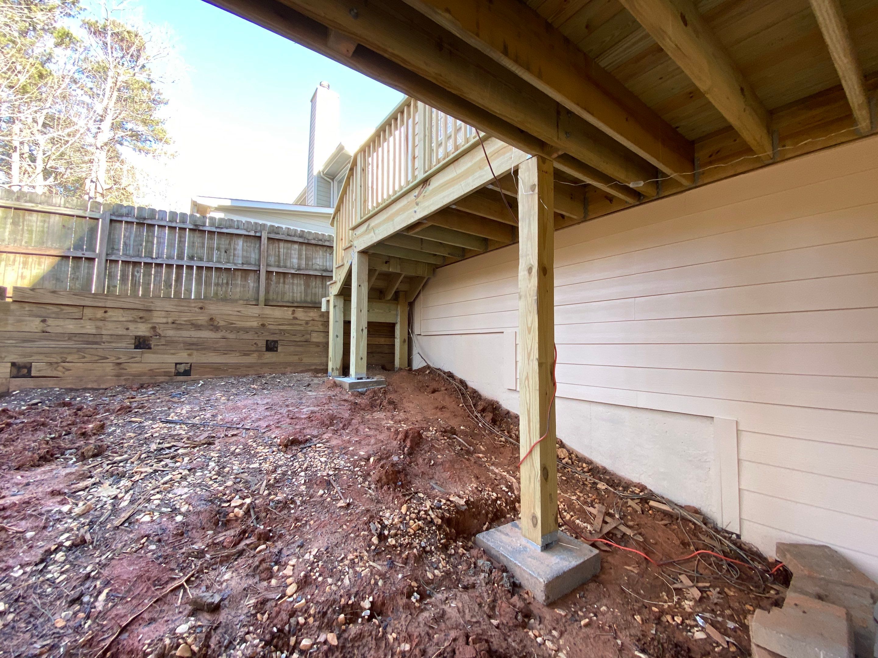 Elevated Pressure-Treated Wood Deck Replacement and Staircase in Duluth by Swift Home Renovations