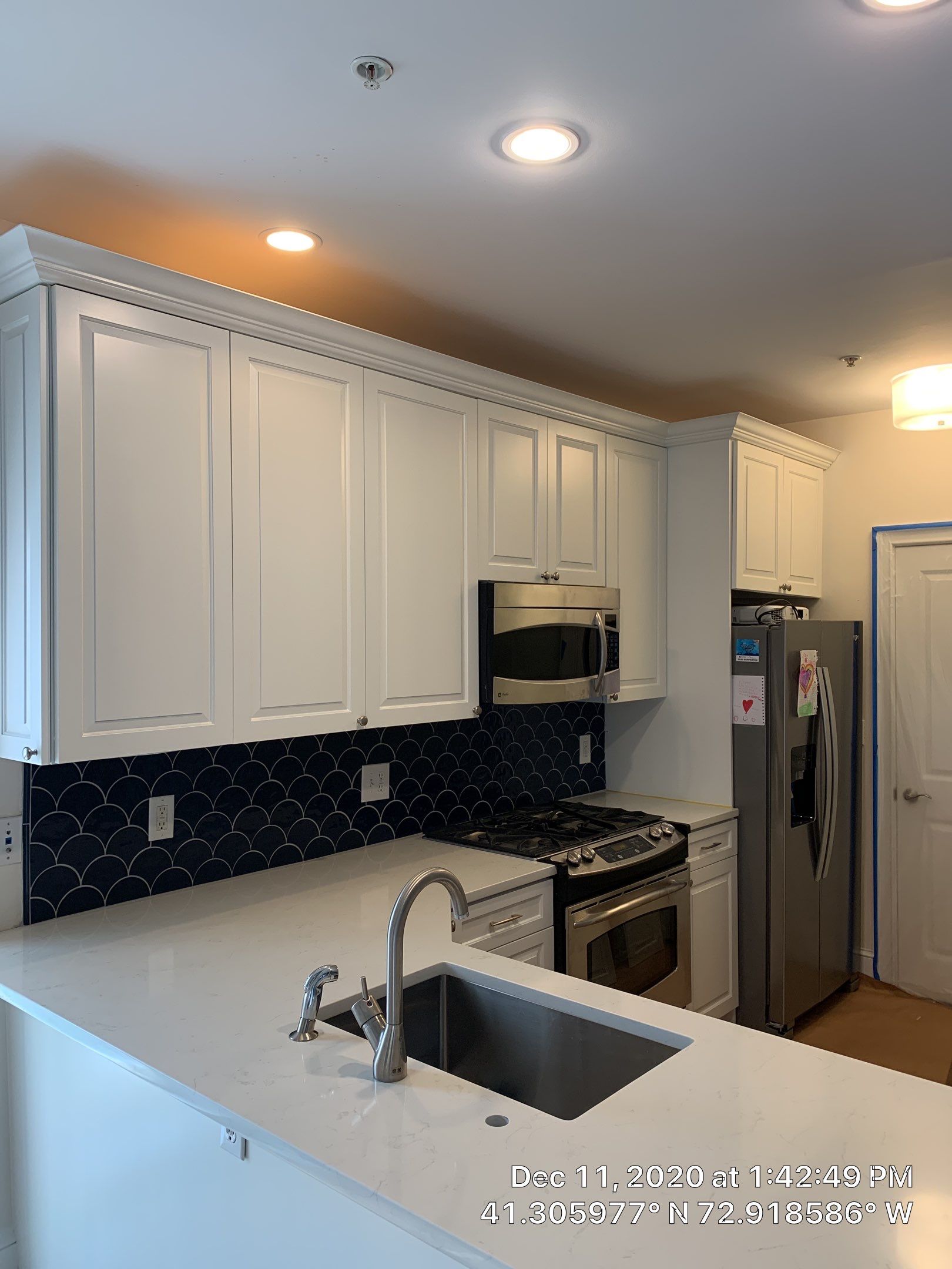 Kitchen Cabinet Painting using Milesi 2k by Trendy Walls Inc.