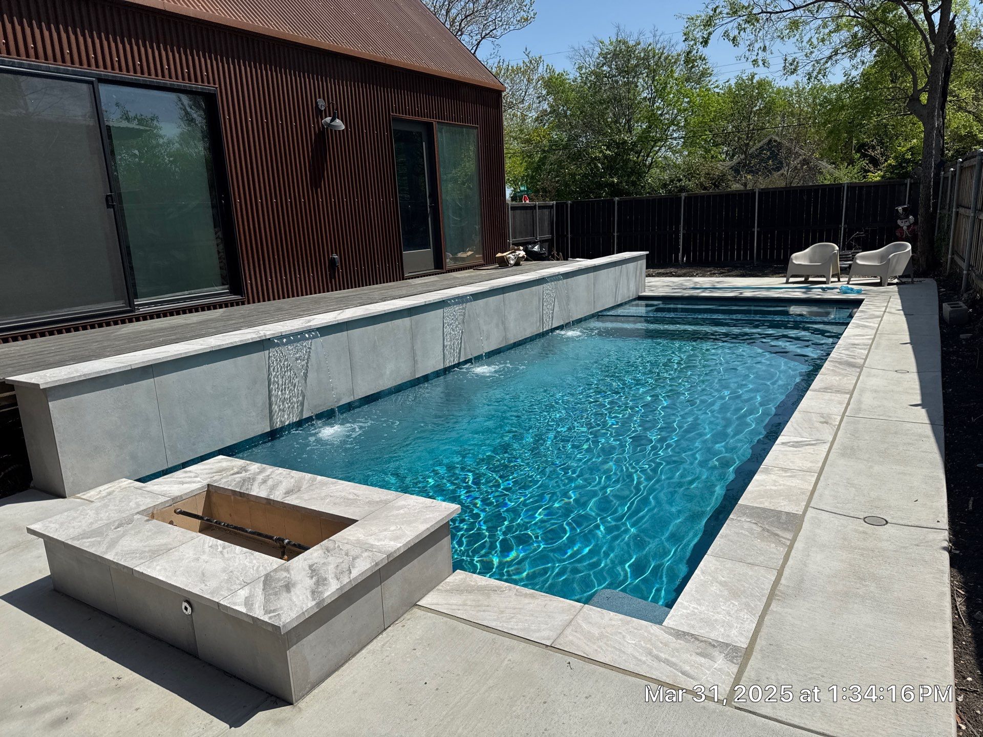 Modern Pool with Fire Wall by Pinnacle Pools and Spas - DFW