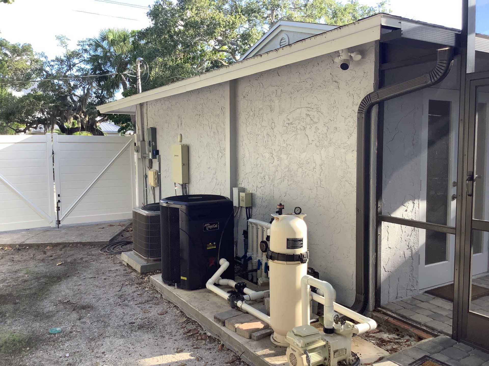 Black Seamless Gutters Installation in Siesta Key FL by Gutter Professors