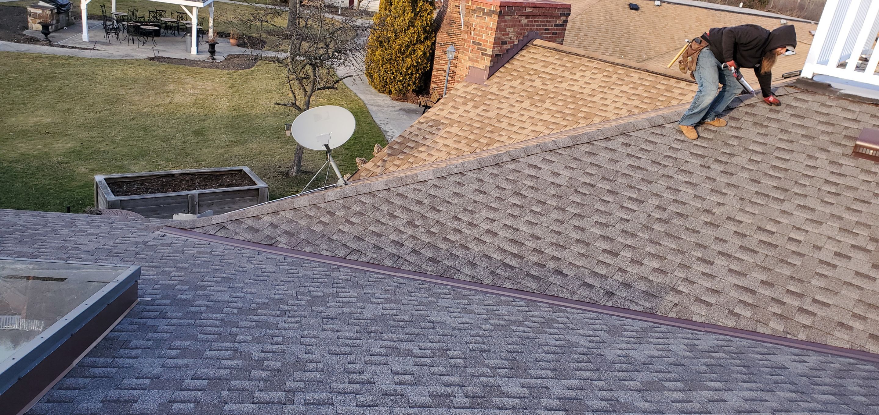 Skylight removal and install  by Absolute Roofing and Construction