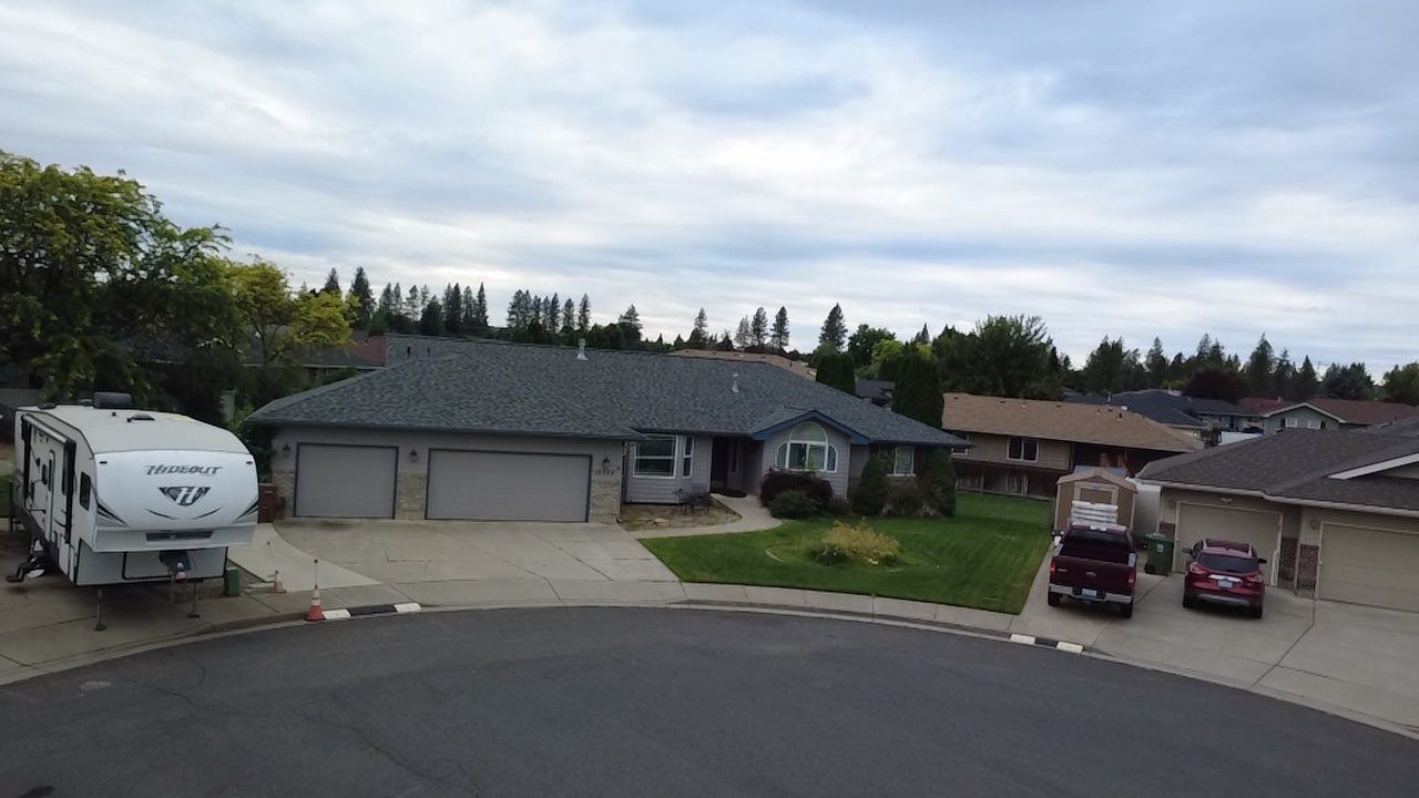 Spokane Residential Roof Replacement With Solar Panel and Skylight Integration N Portsmouth Ct Spokane, WA 99208  The Denali System - Certainteed Landmark® Shingle - Granite Gray by Alpine Roofing