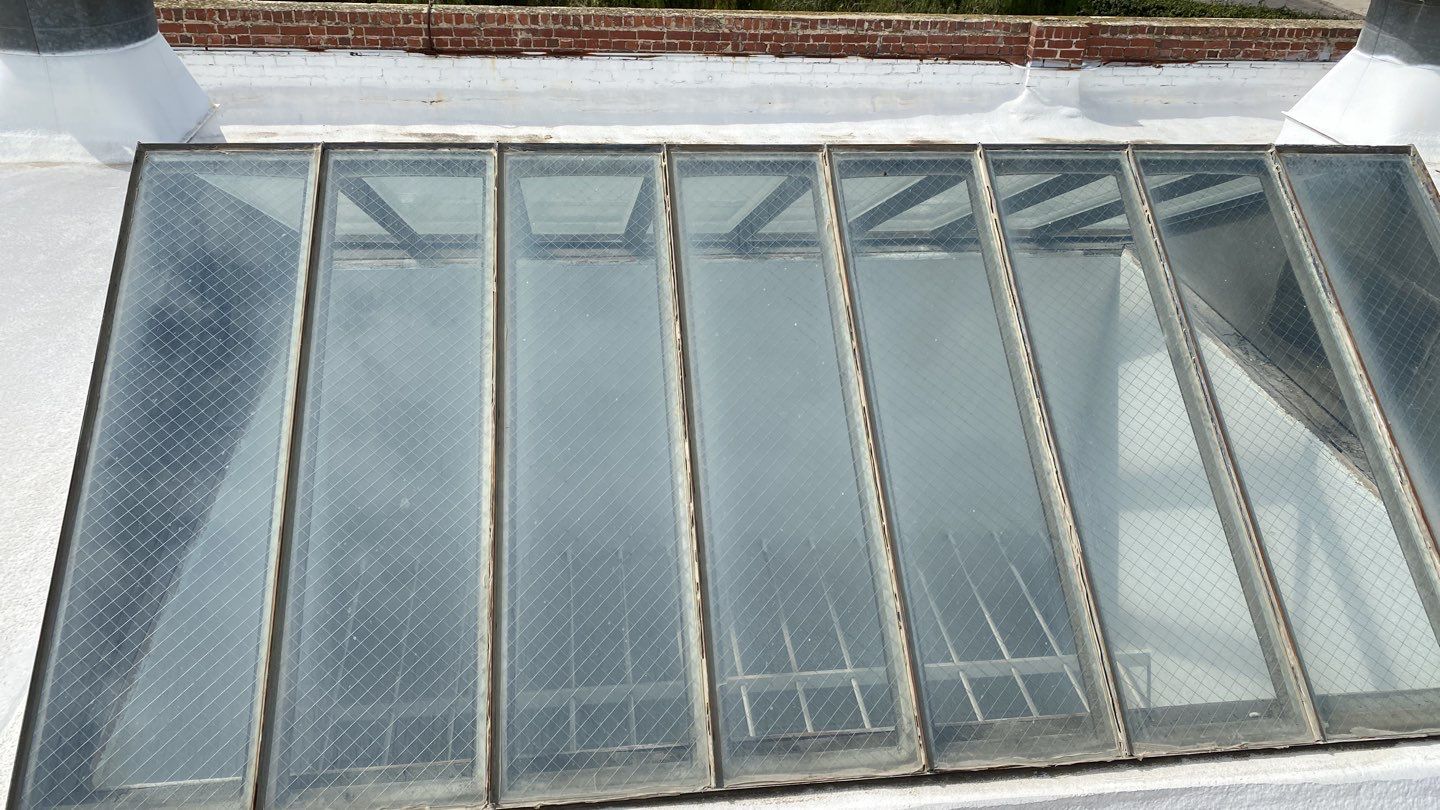 Polyurethane foam roof refurbish and recoating by Straight Edge Roofing Inc