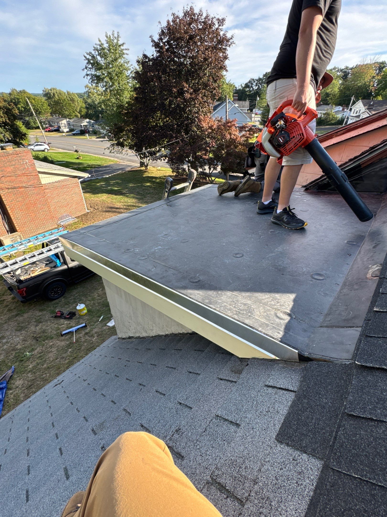 Dormer Reconstruction and Rubber Roof Repair - Manchester NH by Compass exteriors