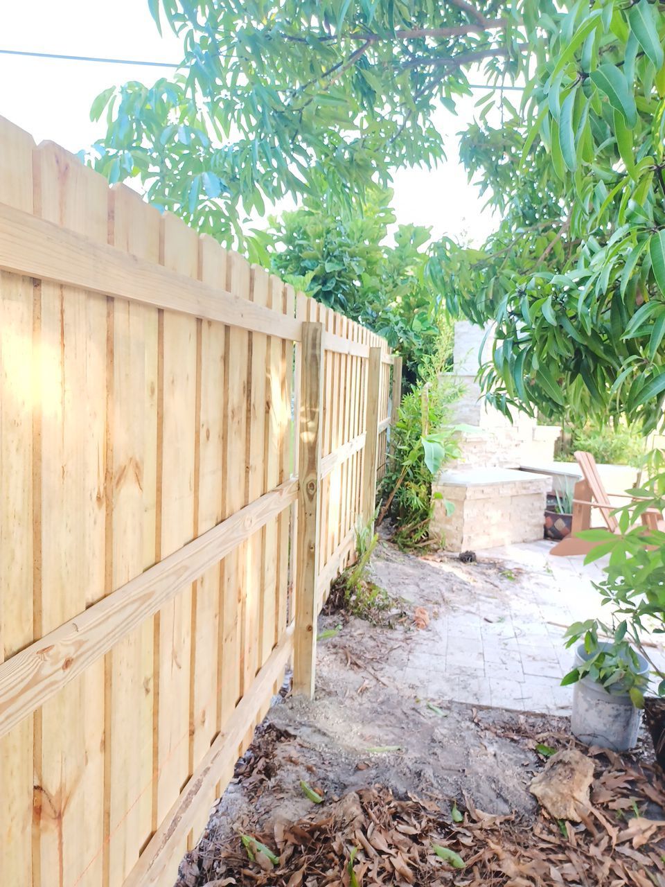 Sarasota, FL 6ft. Tall Treated Board on Board Wood Fence by Asap fence and gates, LLC