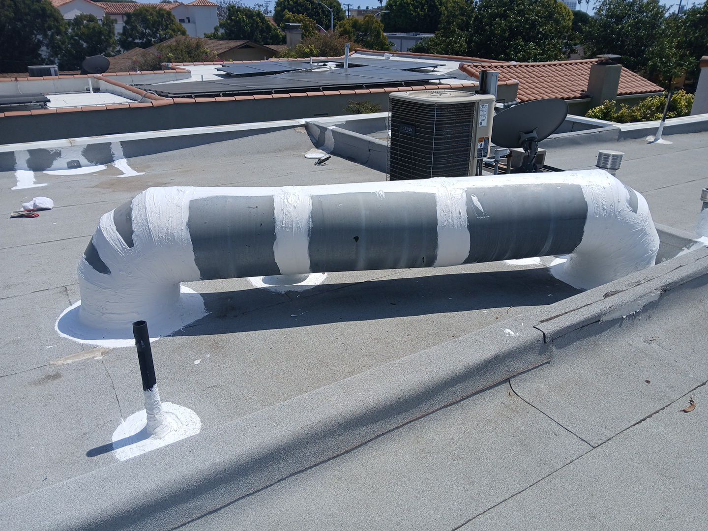 Silicone Membrane Installation using American Standard Coatings Silicone-S by Hull Brothers Roofing