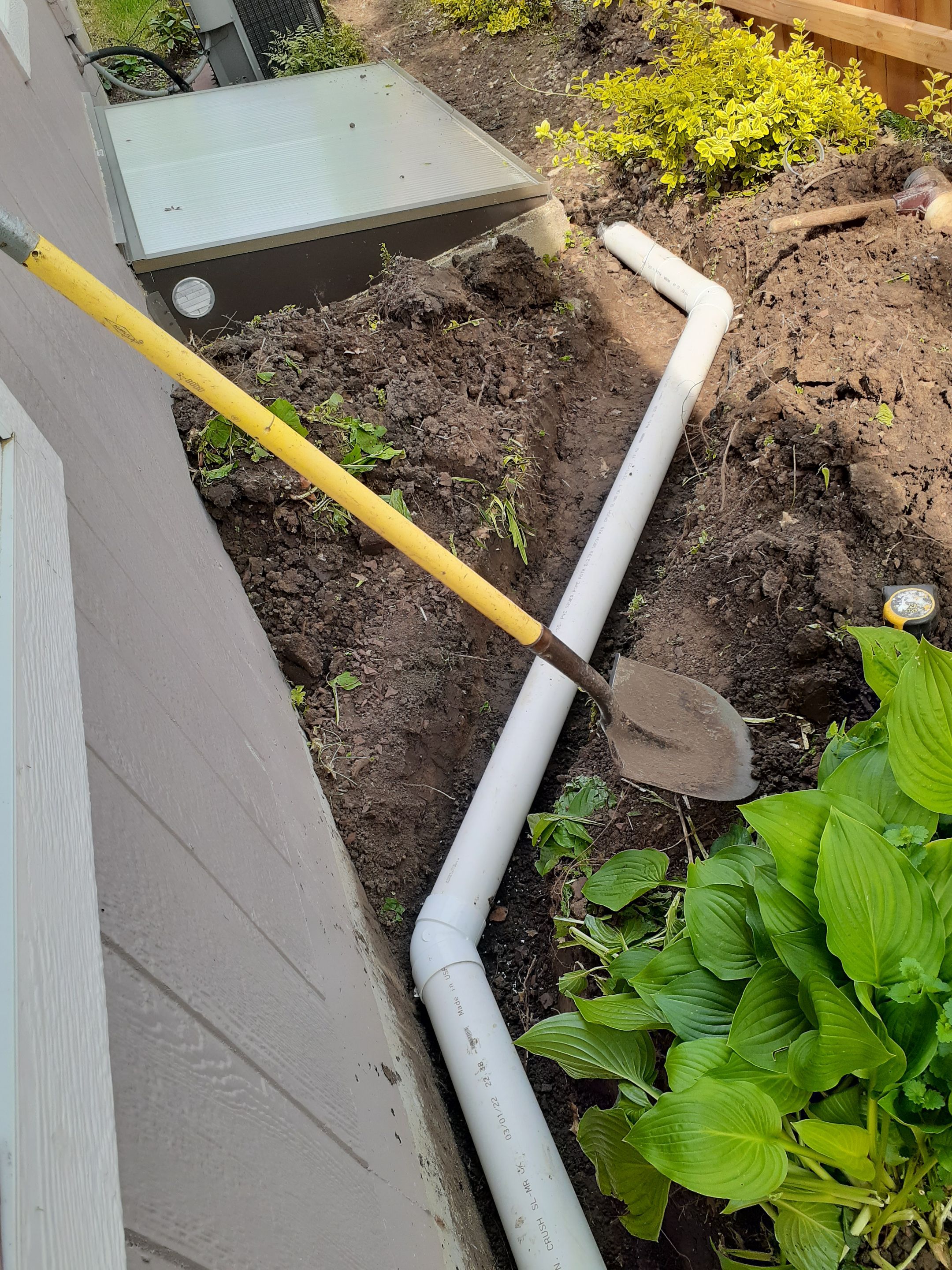 Drainage and Downspout Installation by LAND ESCAPES LLC
