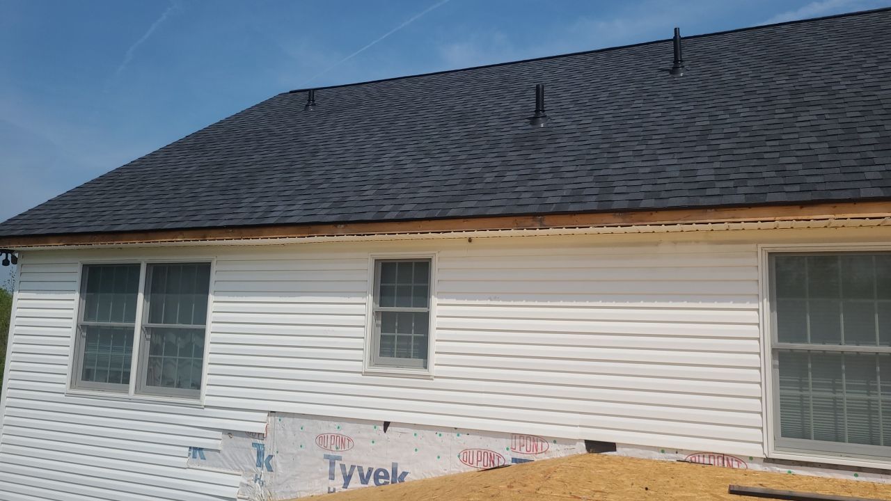 Roof Damage using Certainteed Lifetime Roofing System- Moire Black Landmark Pro shingkes with shadow ridge caps. by BulletpROOF Exteriors