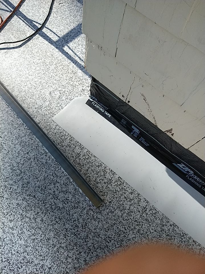 Residential Roofing Installation, Dec-tek walk-out porch roof, siding on garage by Absolute Roofing and Construction
