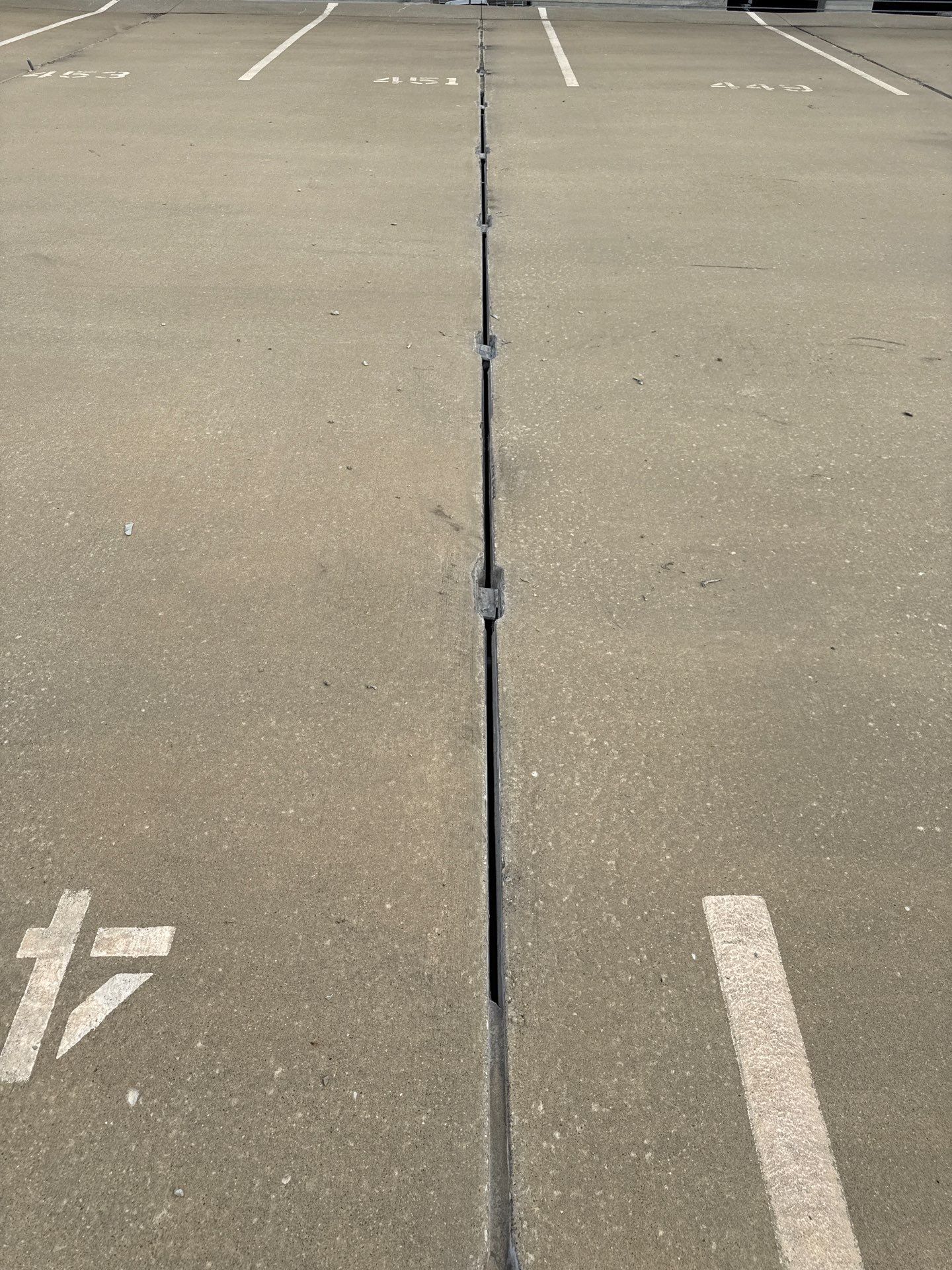 Comprehensive Concrete Joint and Crack Repair for Louisville Parking Garage Top Deck by Performance Waterproofing LLC