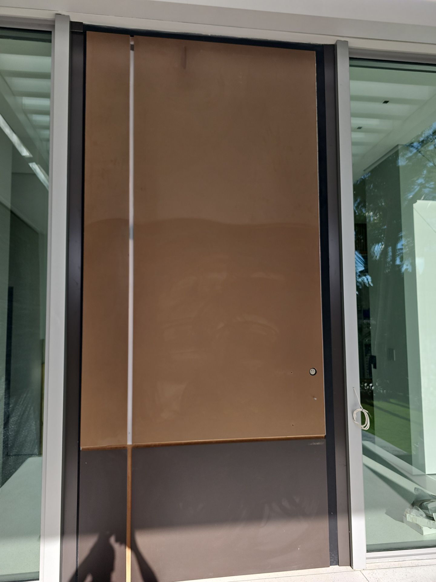 Door Installation using FBS Hurricane Certified Pivot Door by FBS Systems Inc