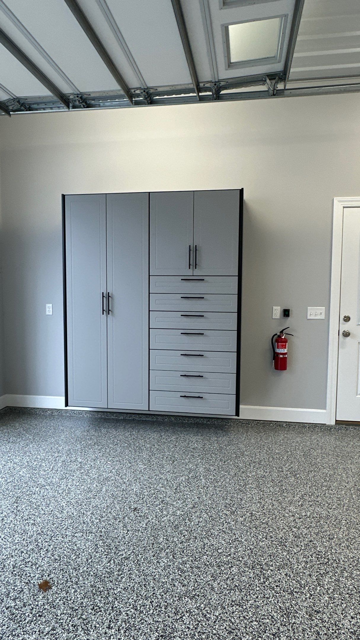 Pat F upgraded his garage with a cool Two-tone cabinet setup by Banner Garage