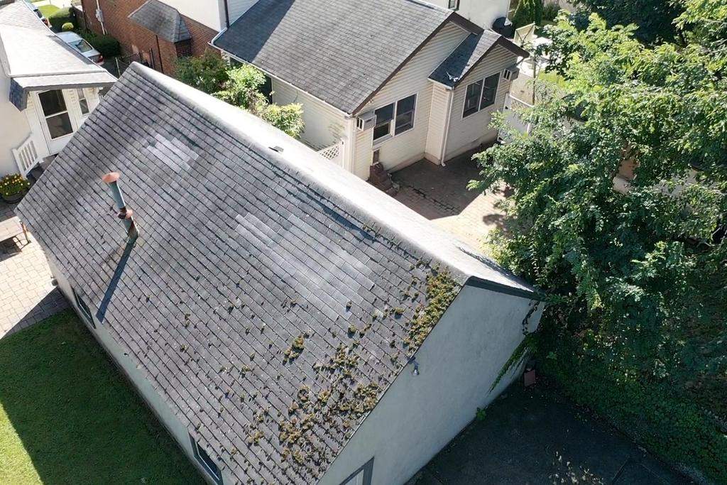 New Roof & Gutters by Island Roofing Inc.