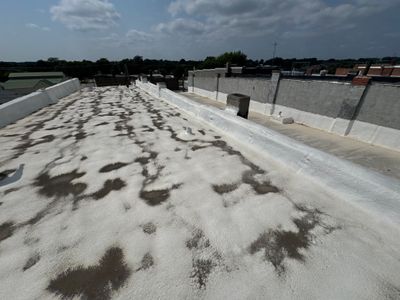 Commercial Flat Roof Elastomeric Coating and Repair in West Point by Crows Roofing LLC