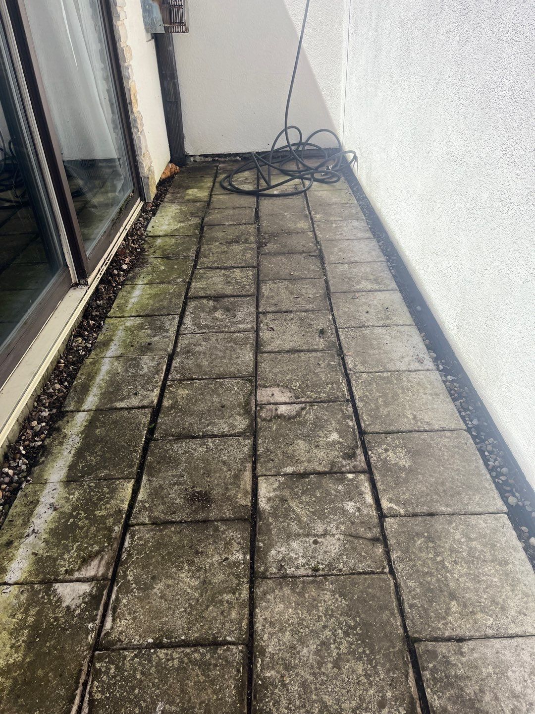 natural stone using Algaecide, soft wash soap by Northern Power Washing LLC.