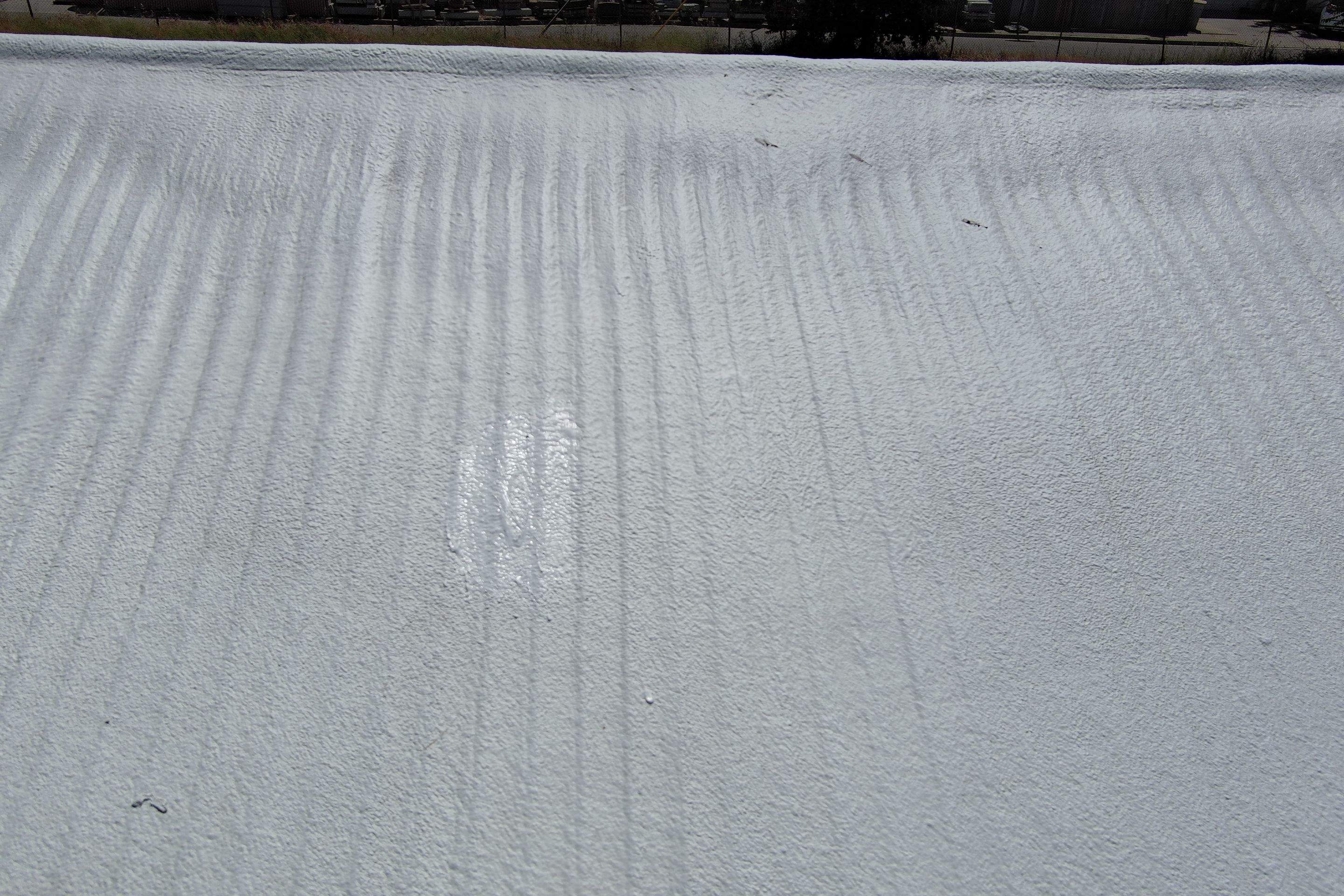 Spray foam and coatings using Conklin Benchmark/PUMA XL by Straight Edge Roofing Inc