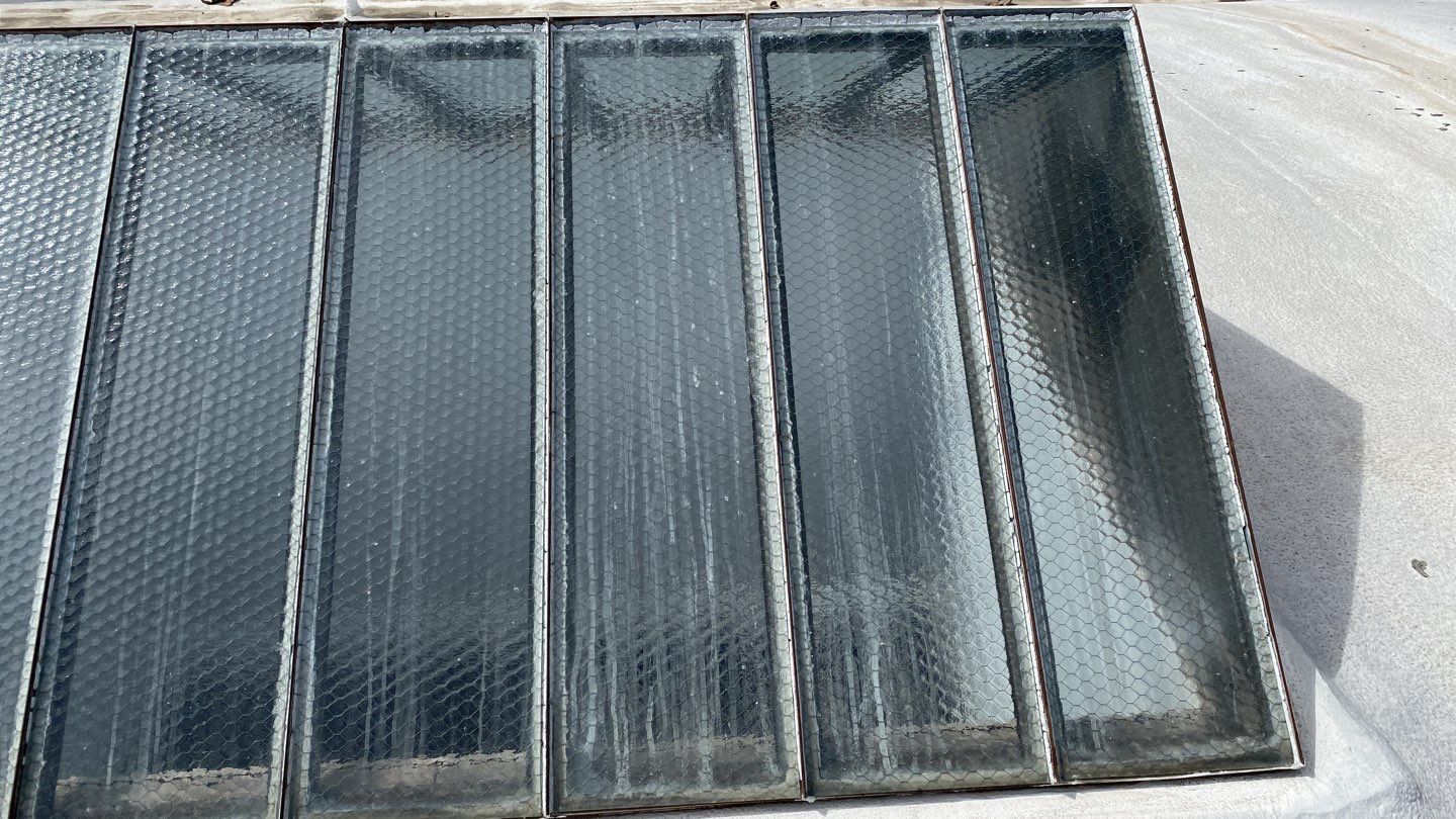 Polyurethane foam roof refurbish and recoating by Straight Edge Roofing Inc