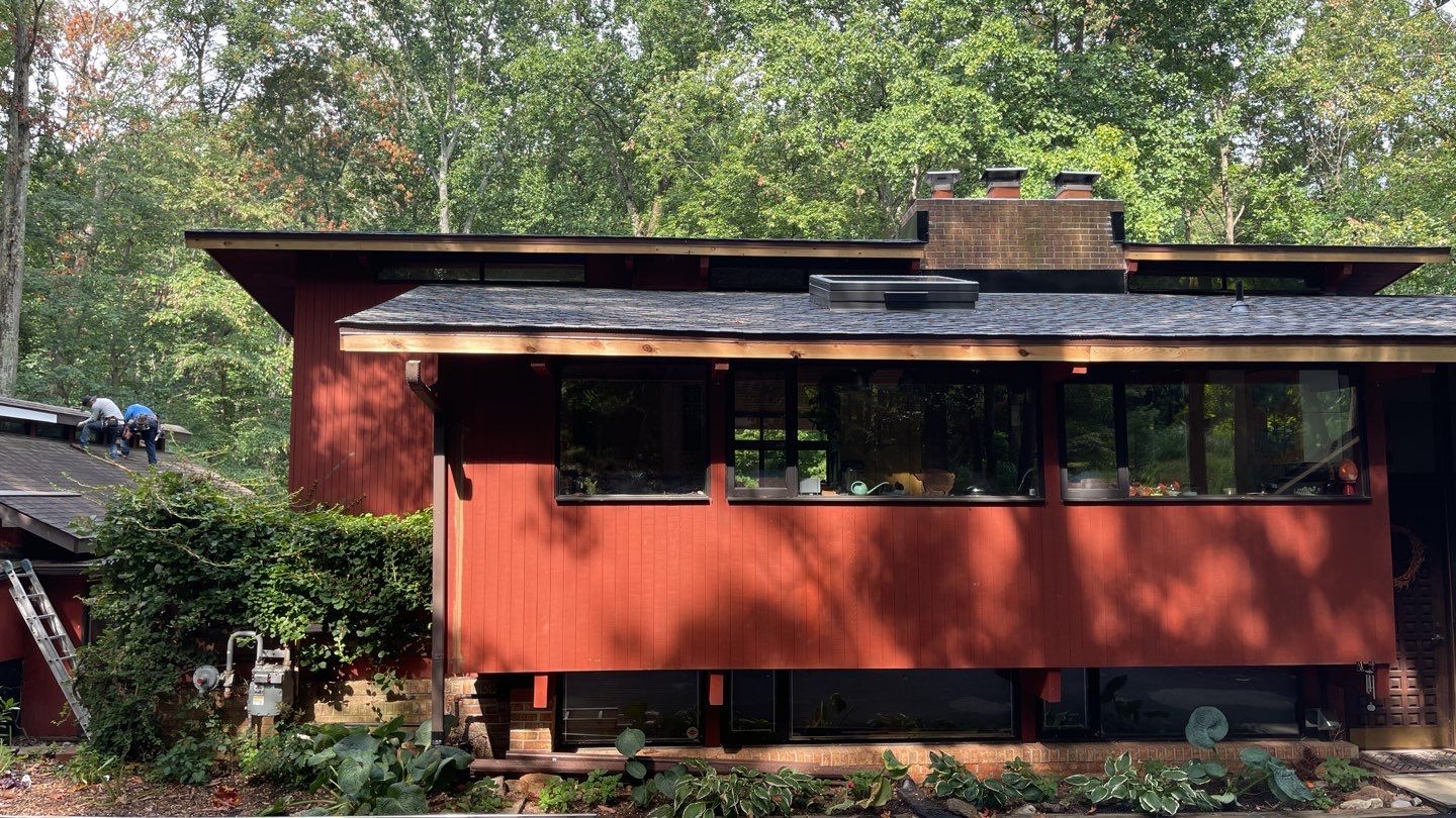 Deckhouse Roof Replacement by American Home Contractors