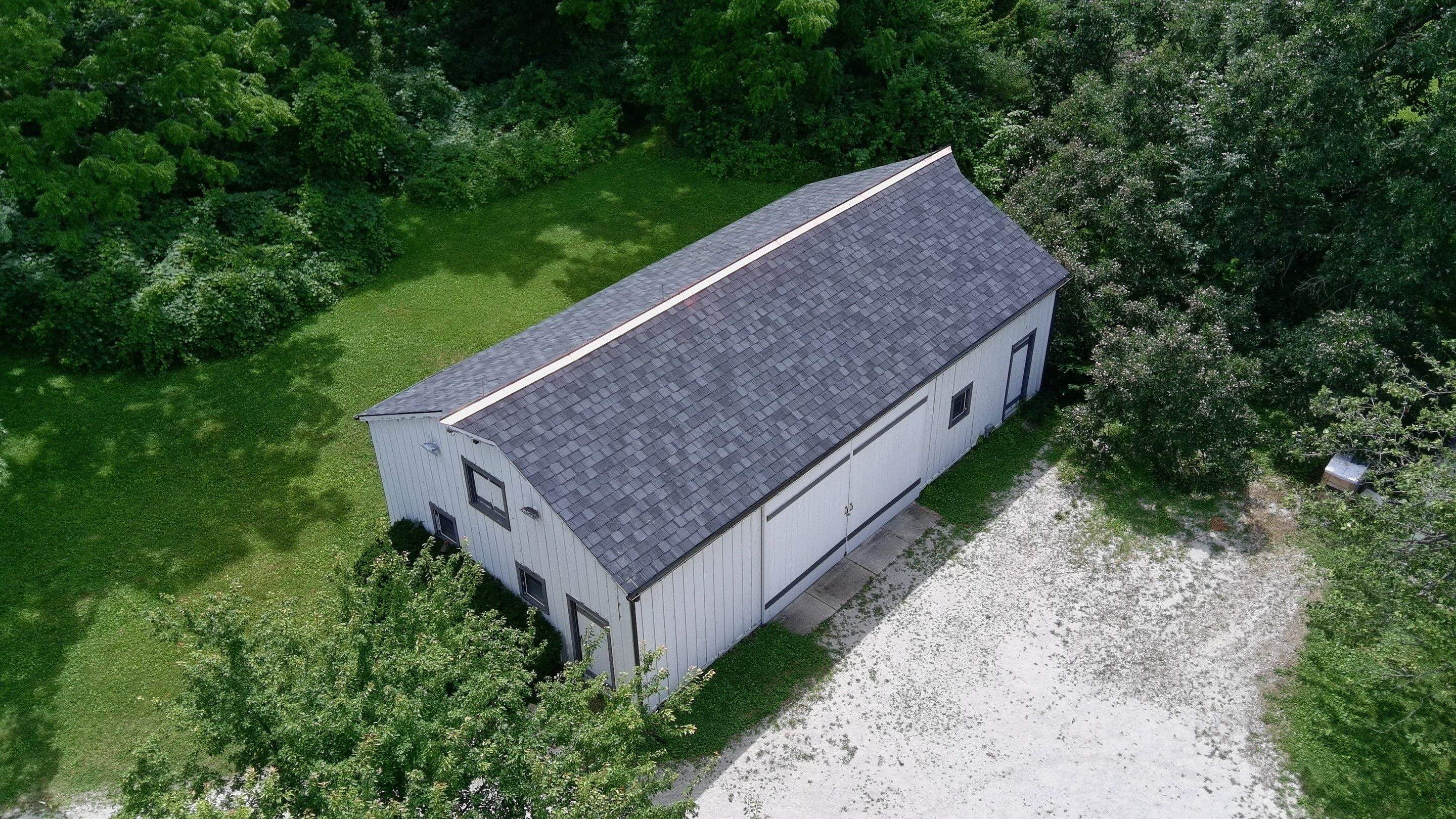 Re-roof: Certainteed Belmont in Black Granite with Custom Copper by Midwest Building Solutions