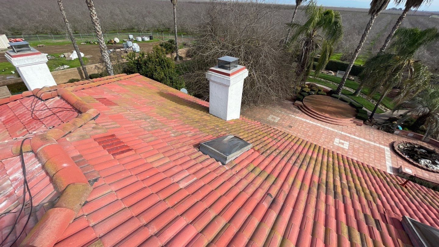 Tile refurbish project using existing tiles and replaced underlayment and battens by Straight Edge Roofing Inc