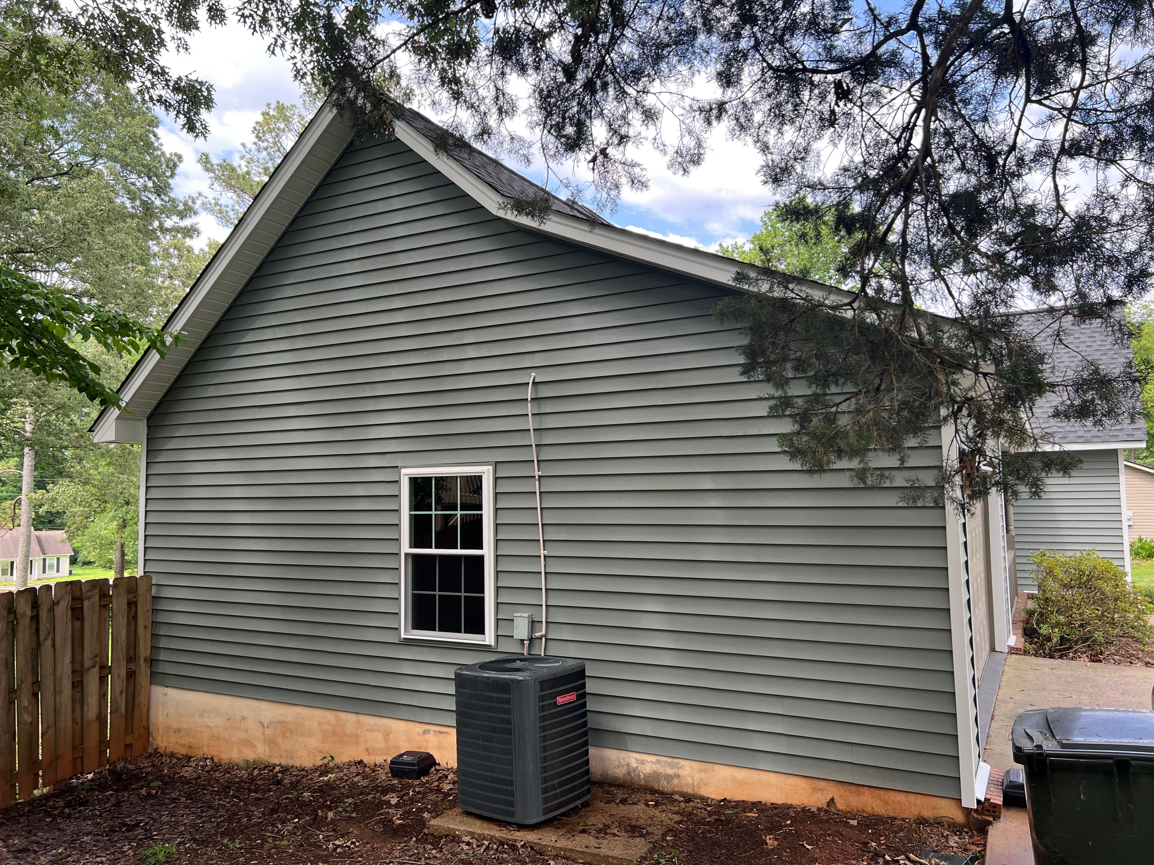 Siding Replacement using Mastic Carvedwood Vinyl Plank by Freedom Exteriors