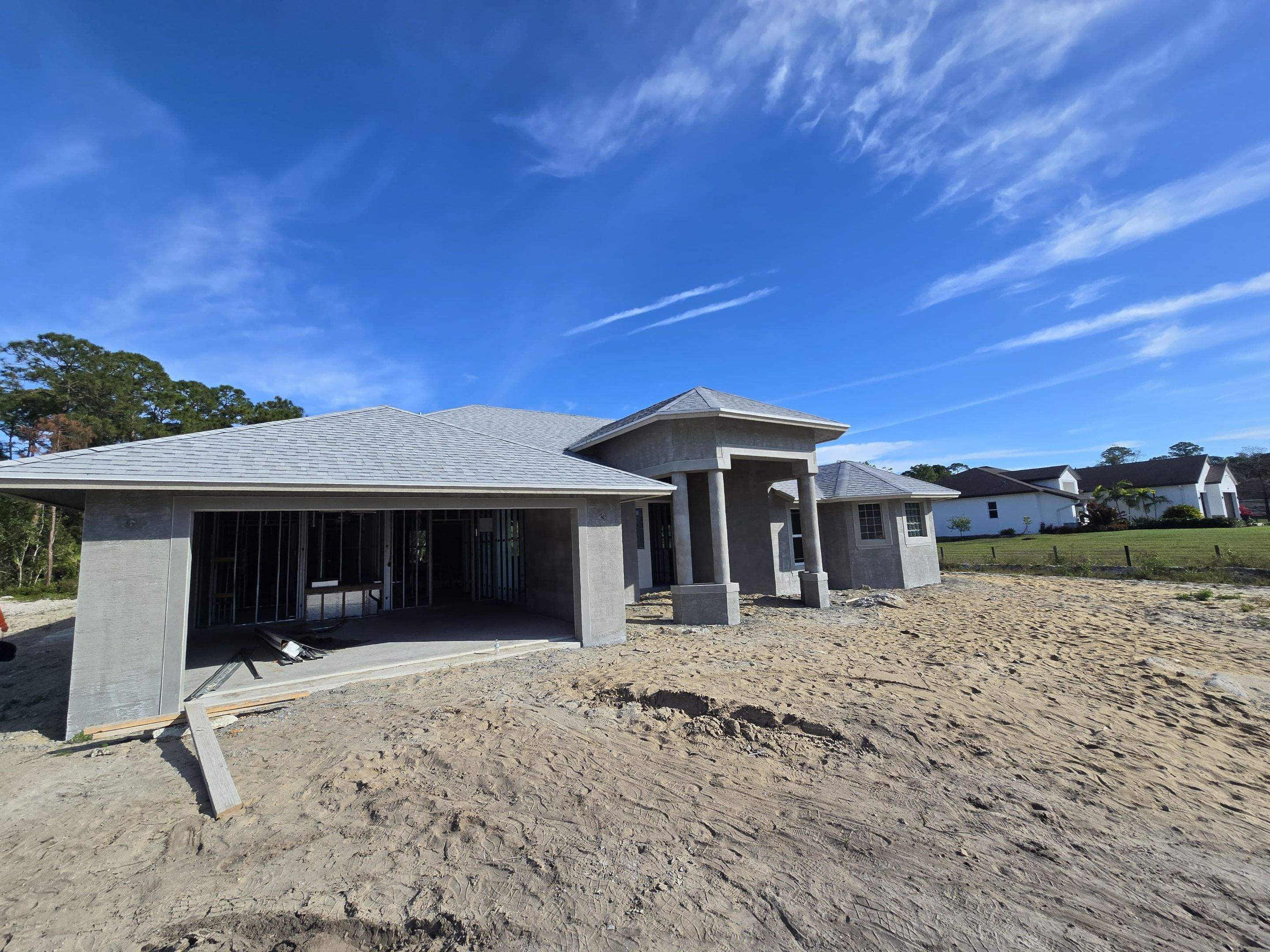 Tamko Heritage Glacier White by Total Roofing System The Metal Roof Experts