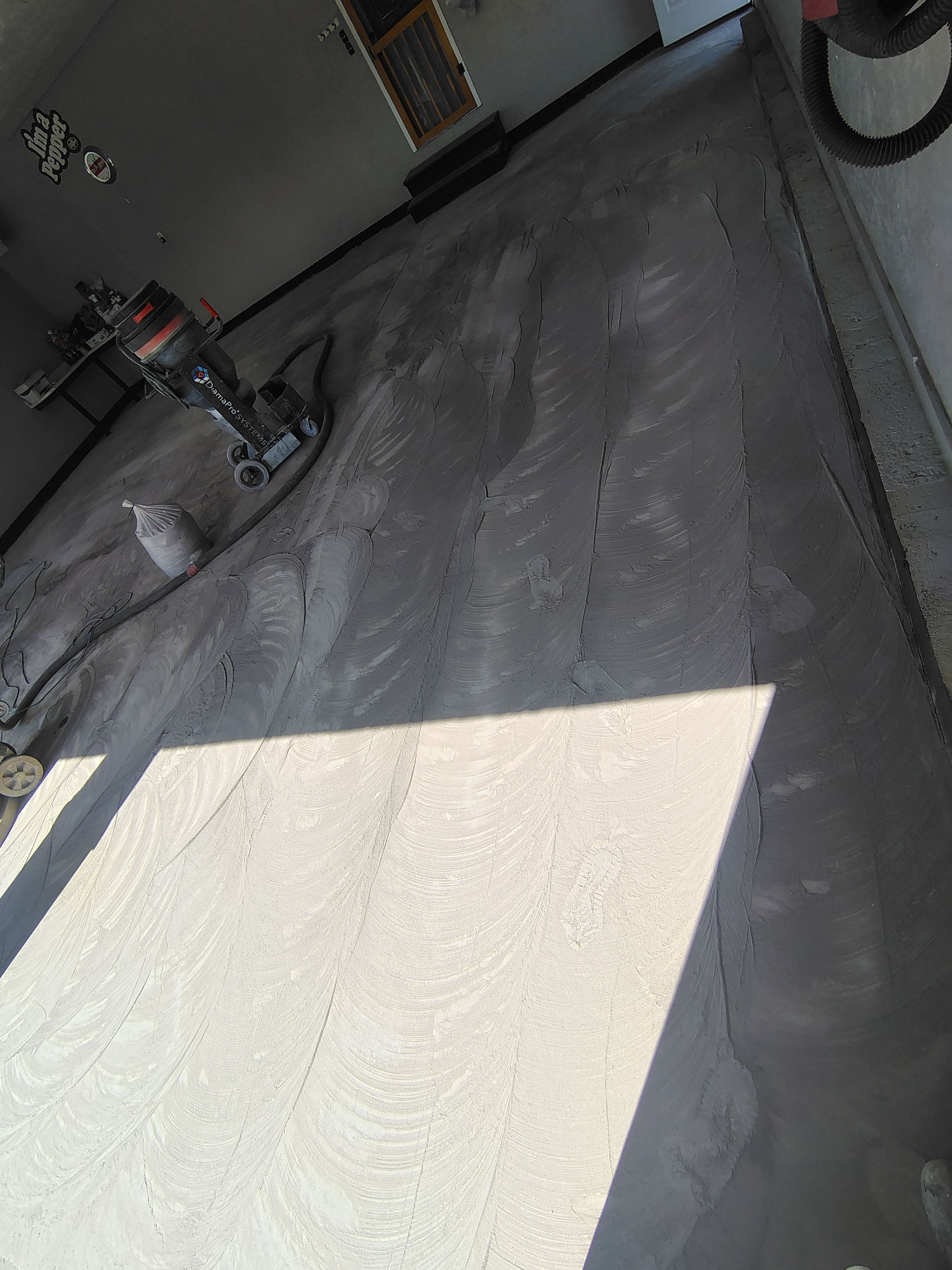 Garage Concrete Floor Coating and Crack Repair in Onawa by Select Painting, Coatings & Garage Cabinets