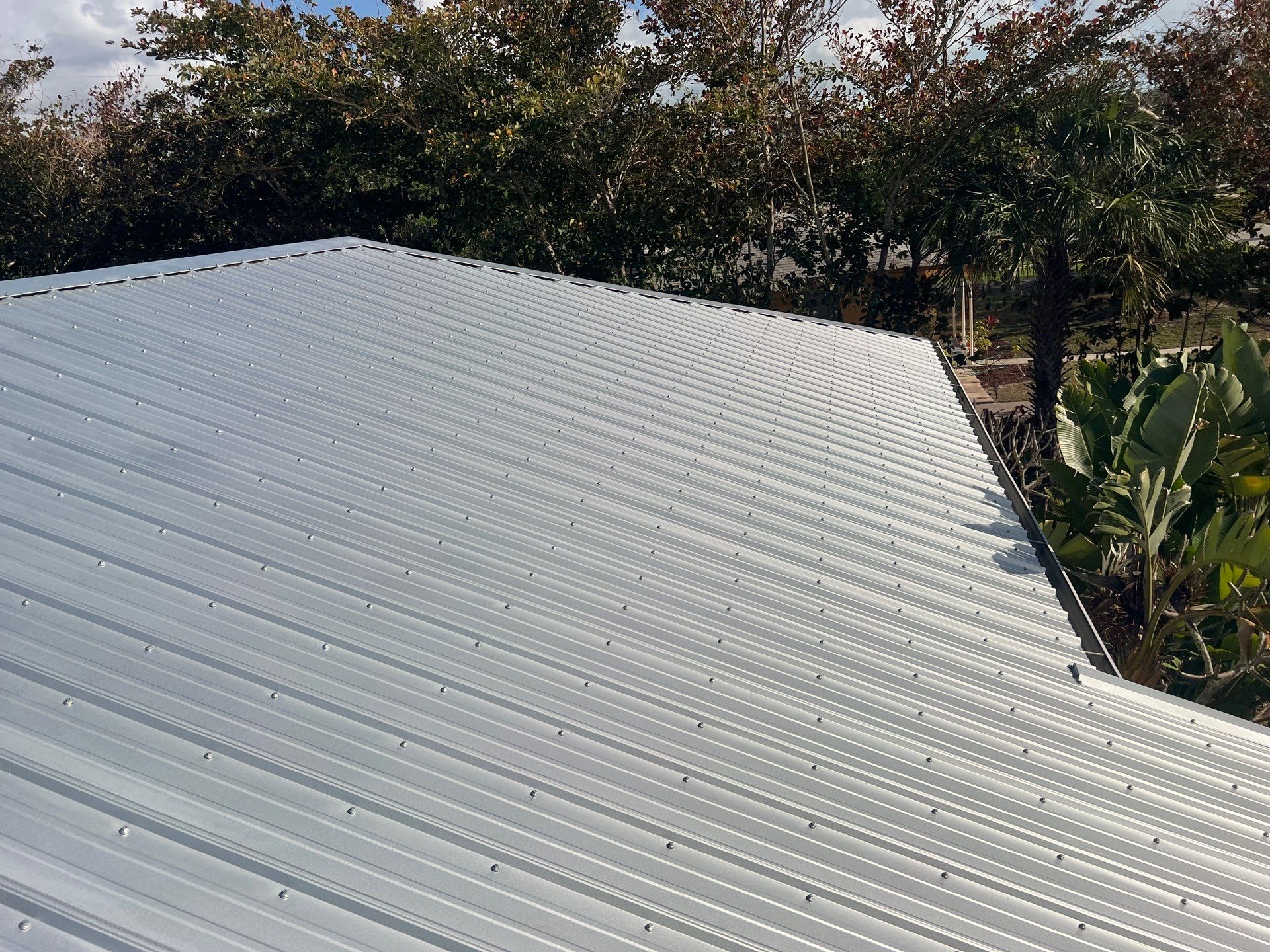 Residential Roofing Installation using Durabull Classic Rib Panel by Durabilis Roofing INC