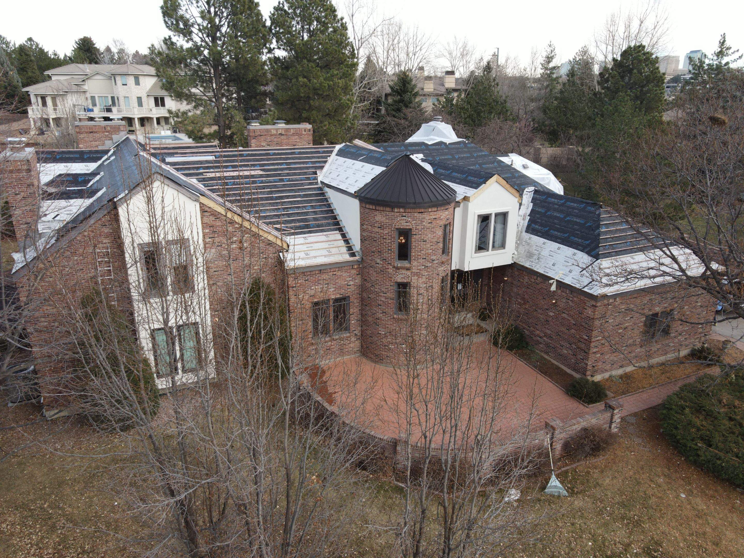 Unified Stone Coated Roof & Stucco Remodle by Blue Peaks Roofing LLC